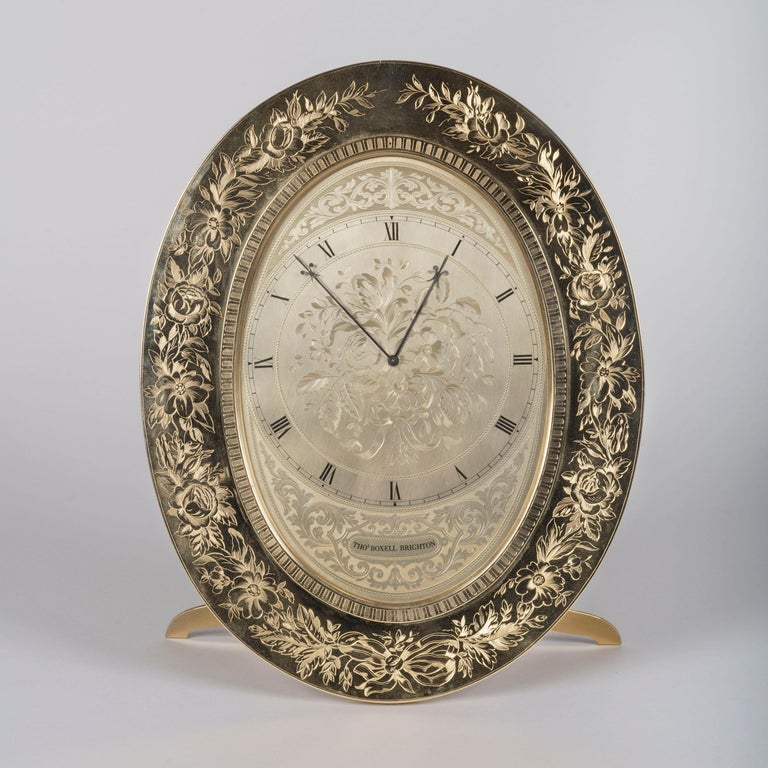 Large Gilt Brass Engraved Oval Table Clock by Thomas Cole For Sale at