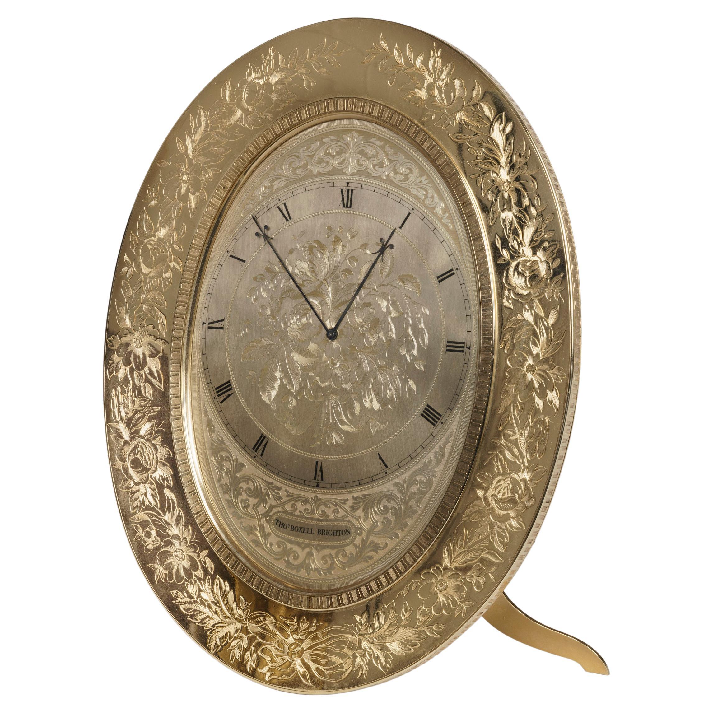 Large Gilt Brass Engraved Oval Table Clock by Thomas Cole For Sale