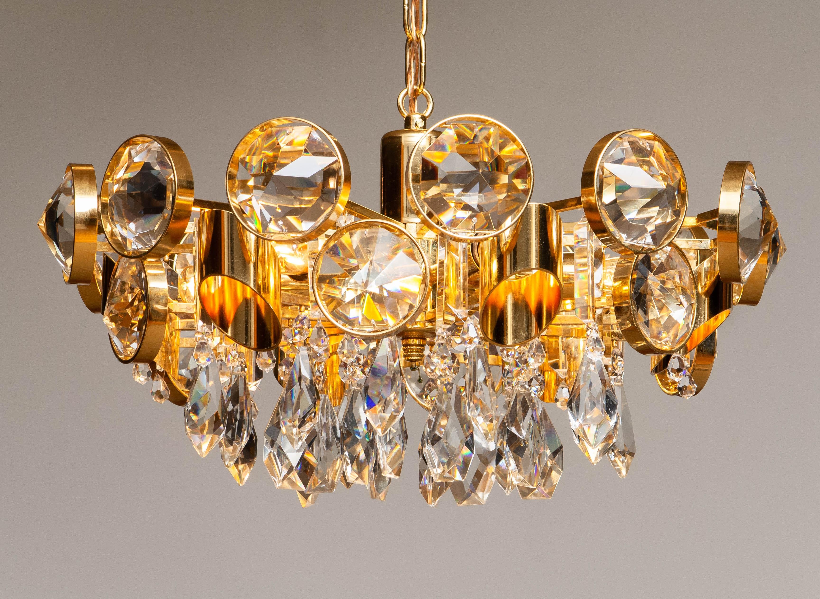 Hollywood Regency Large Gilt Brass With Large Crystals Chandelier By Palwa Austria 1960s For Sale