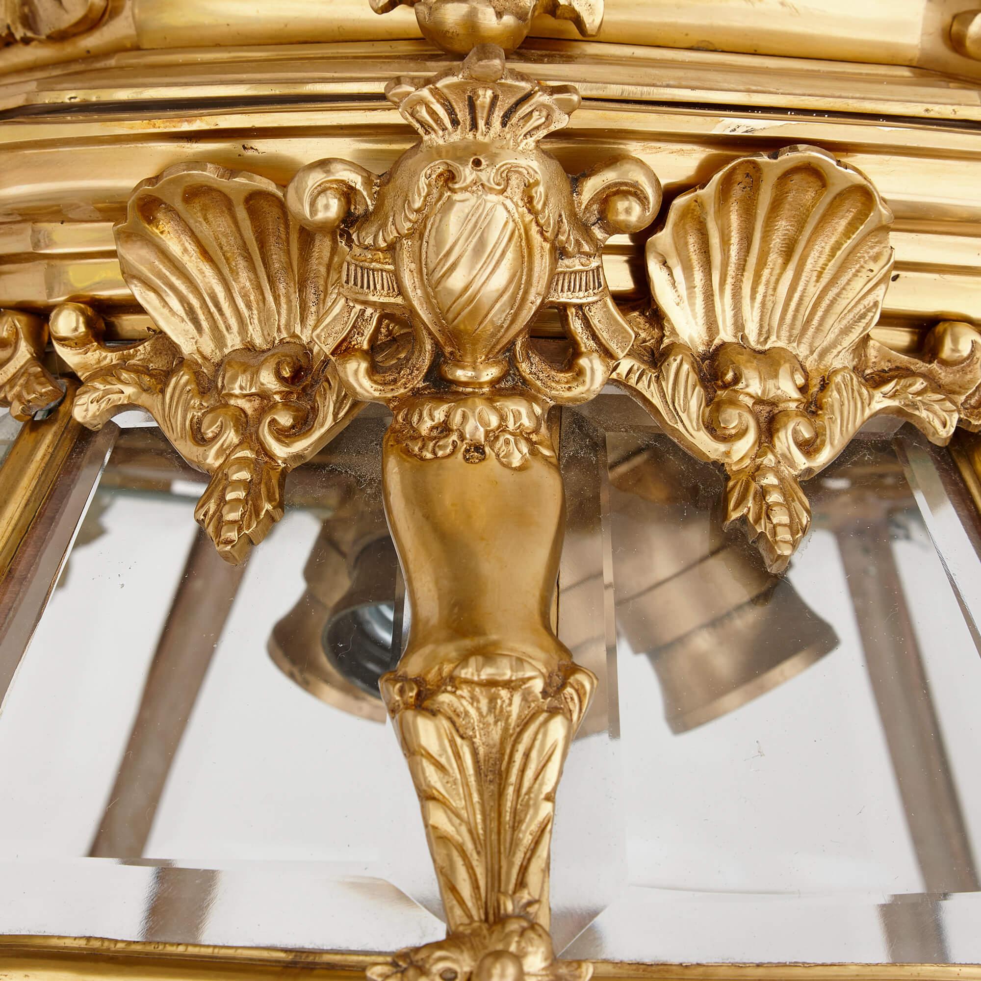 Large gilt bronze and glass ‘Versailles’ lantern
French, 20th Century 
Height 120cm, diameter 55cm

This magnificent lantern was made in France and its design is inspired by one made in the 18th century for the Palace of Versailles. 

Wrought from