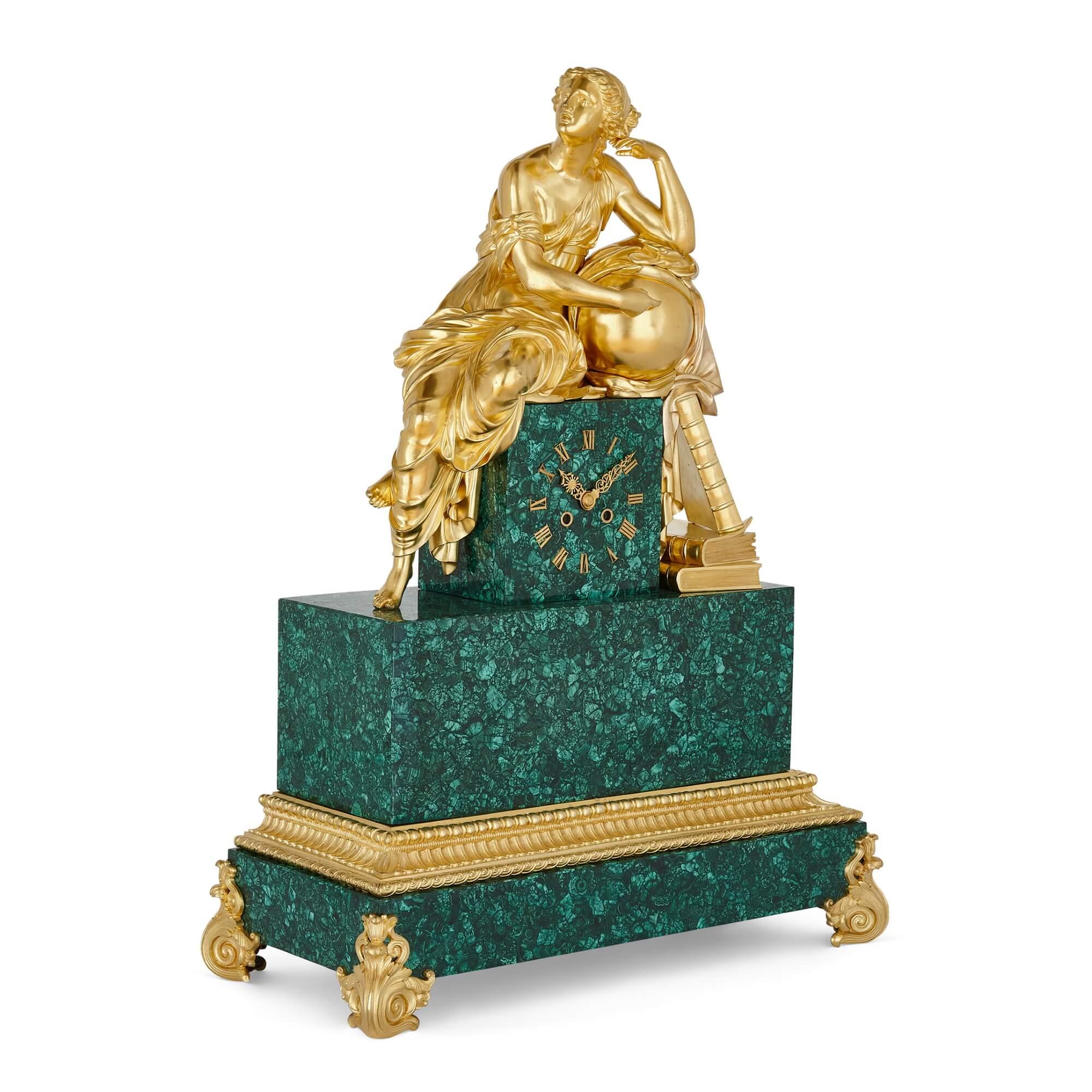 Large gilt-bronze and malachite Charles X style mantel clock
French, 19th Century
Height 74cm, width 53cm, depth 24cm

This superb and impressively large mantel clock is cased in a vibrant malachite veneer, and adorned with radiant ormolu