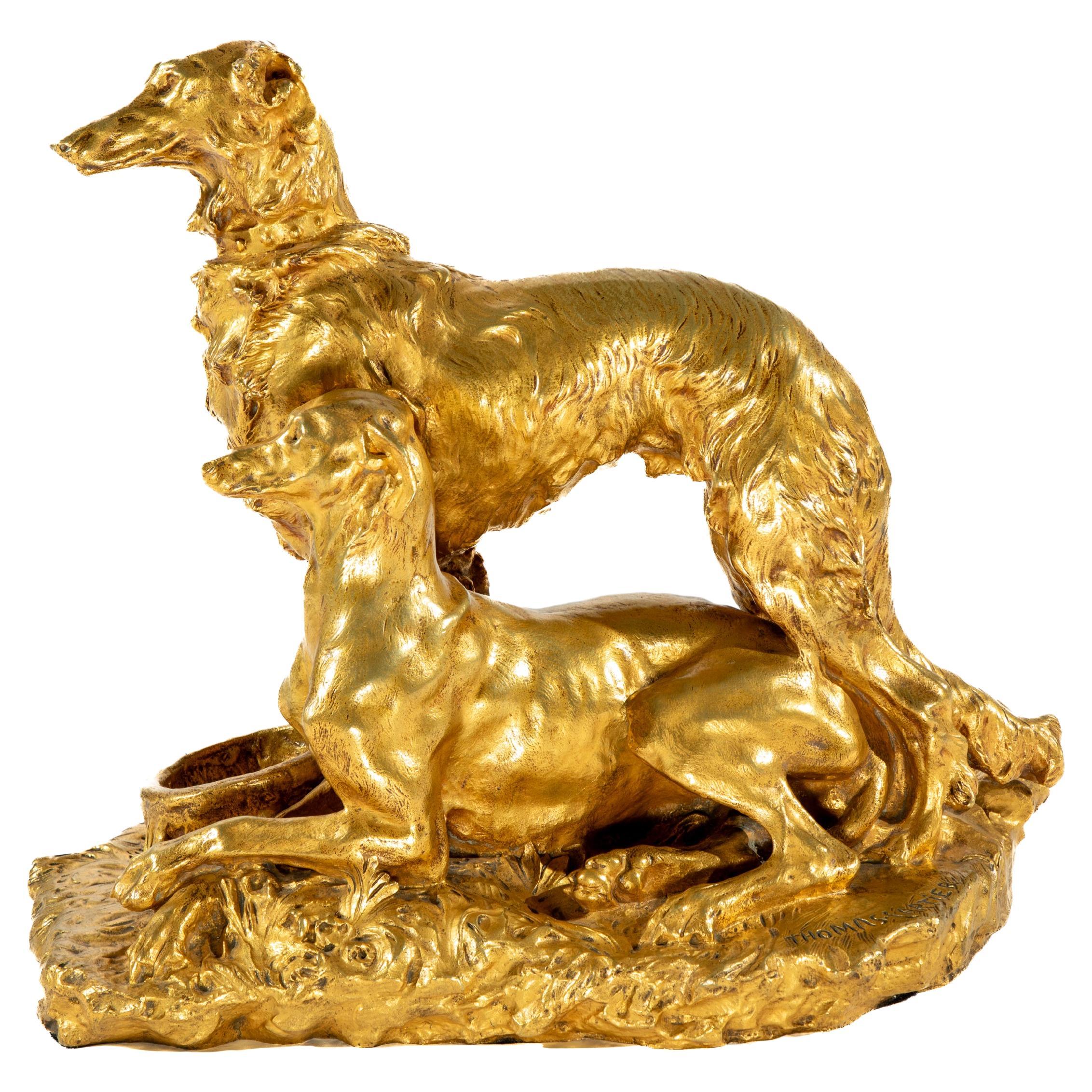 Estatua grande de bronce dorado de dos perros