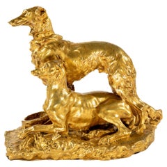 Estatua grande de bronce dorado de dos perros