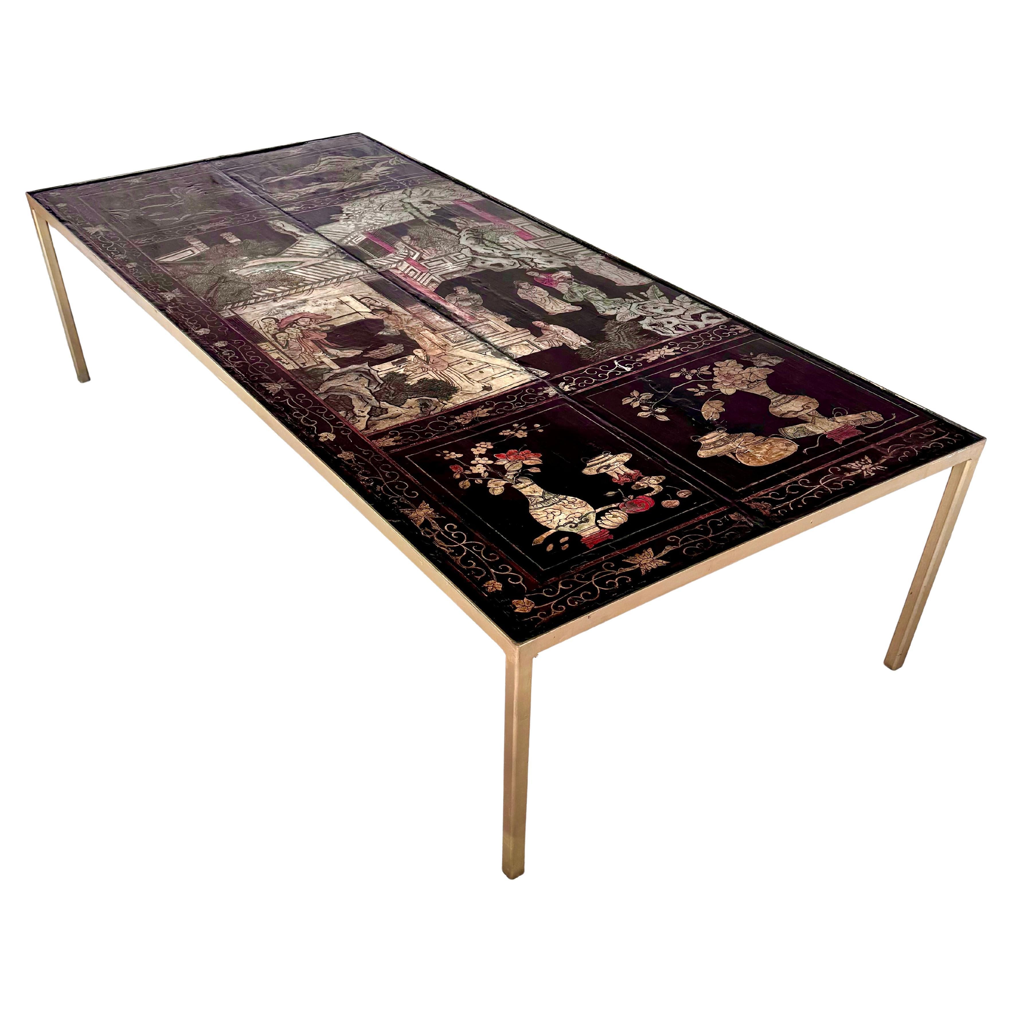 Grande table basse en fer doré et plateau Coromandel du XVIIIe siècle