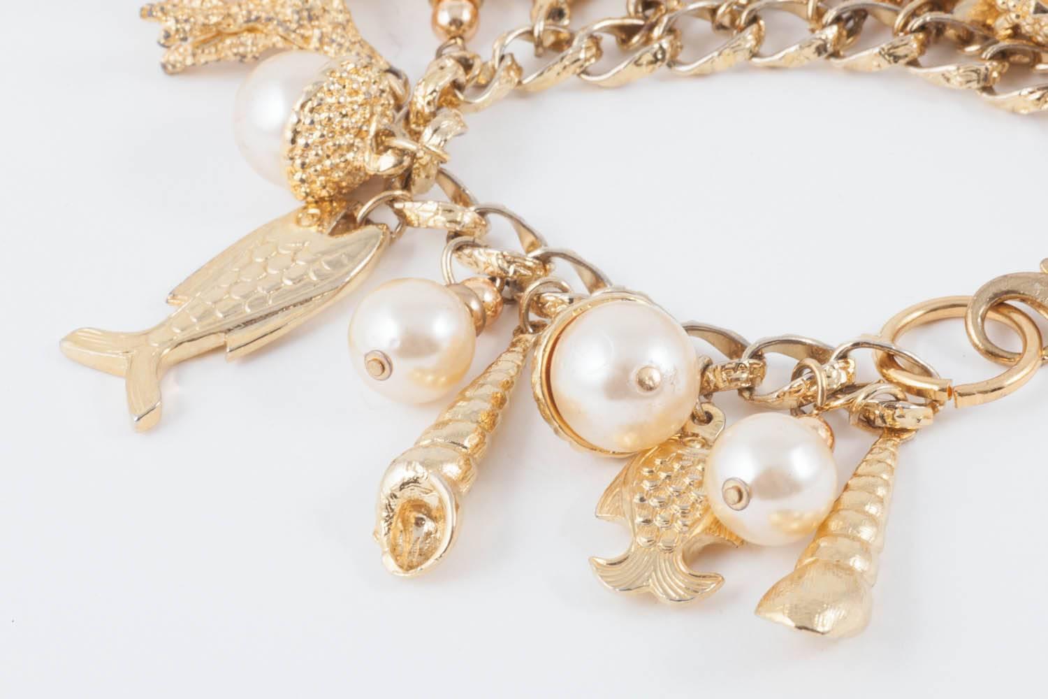 Large gilt metal and paste pearl 'seashell' charm bracelet, USA, 1960s 3