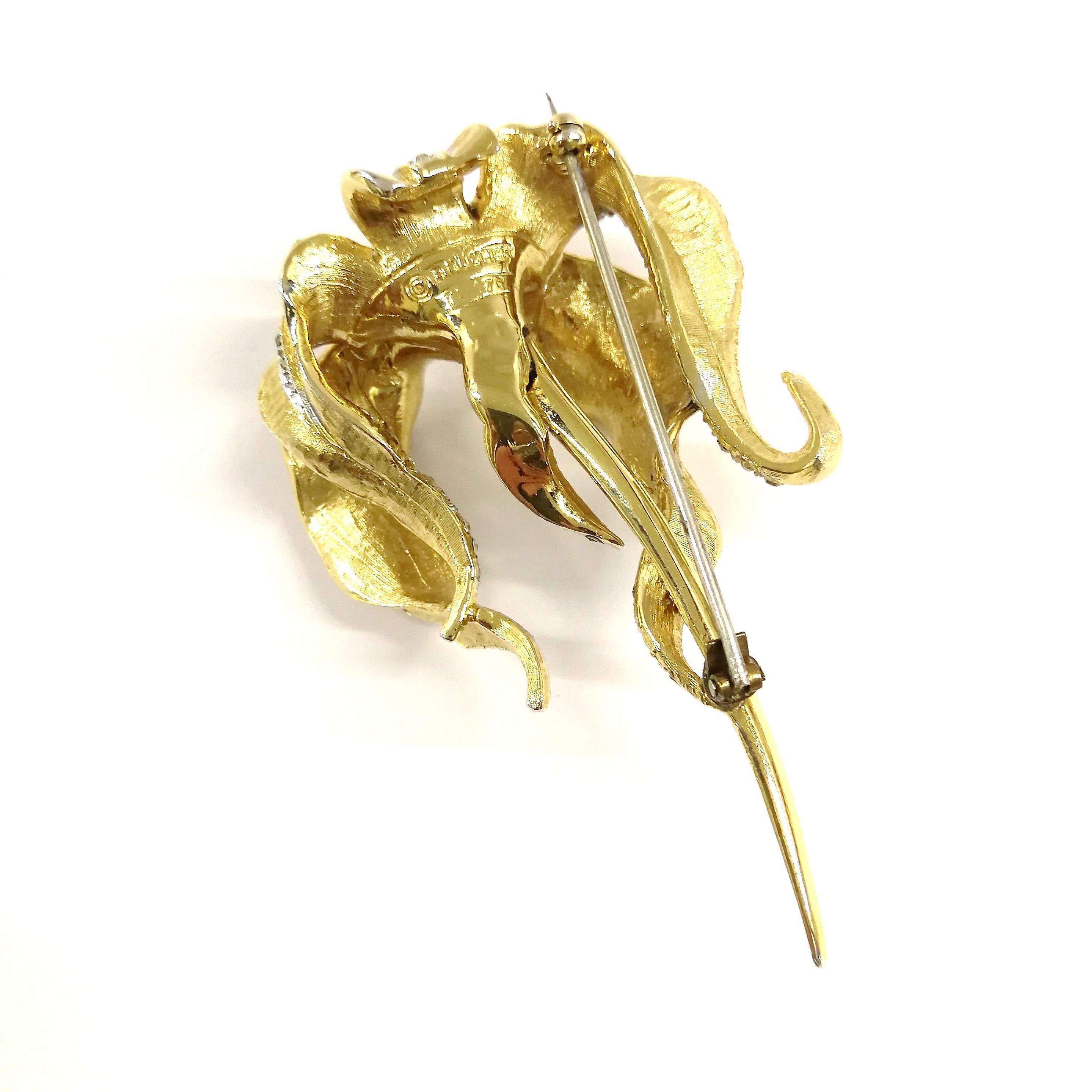Large gilt metal, clear paste 'orchid' brooch, Marcel Boucher, 1960s, USA. In Good Condition In Greyabbey, County Down