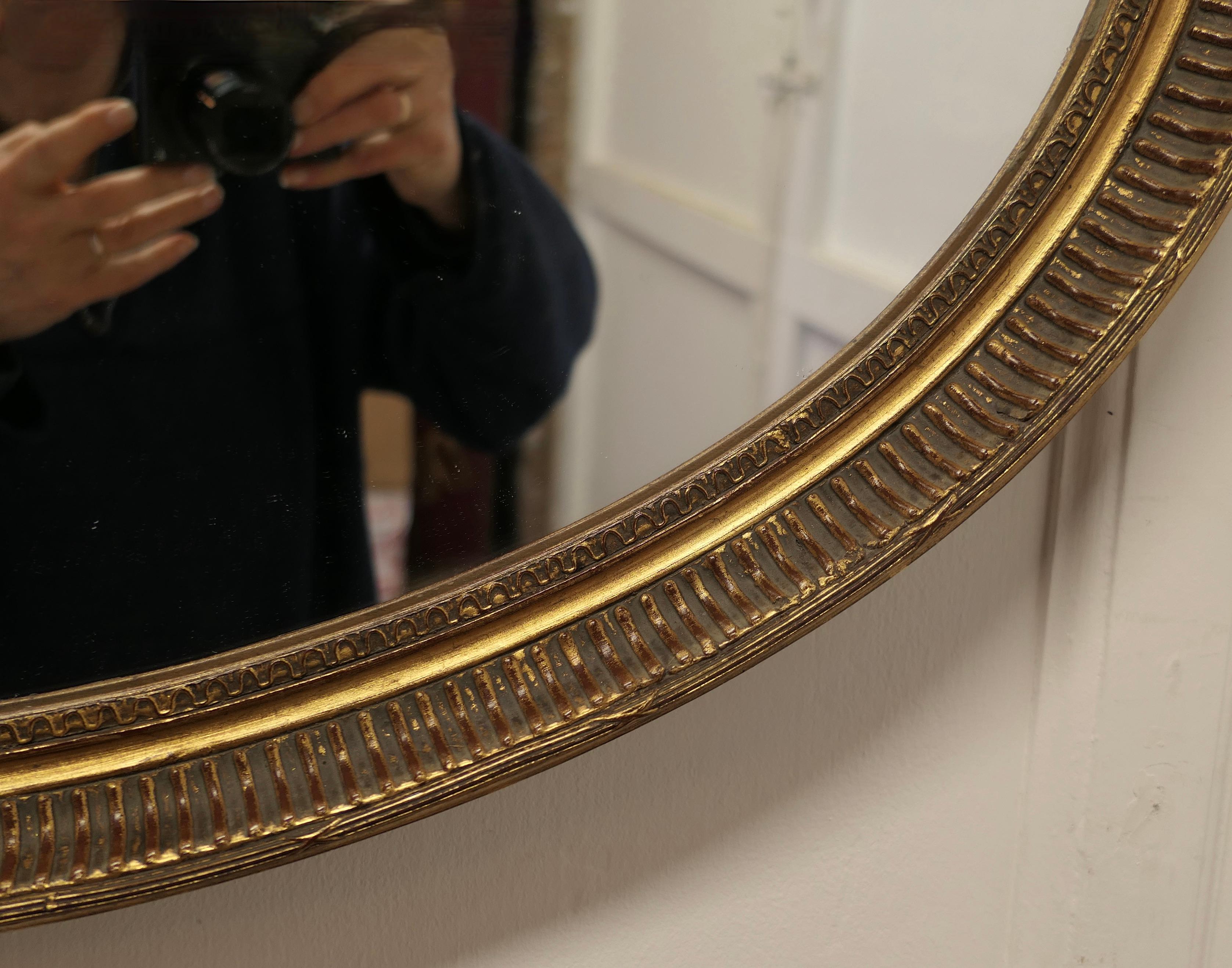 Giltwood Large Gilt Oval Mirror    For Sale