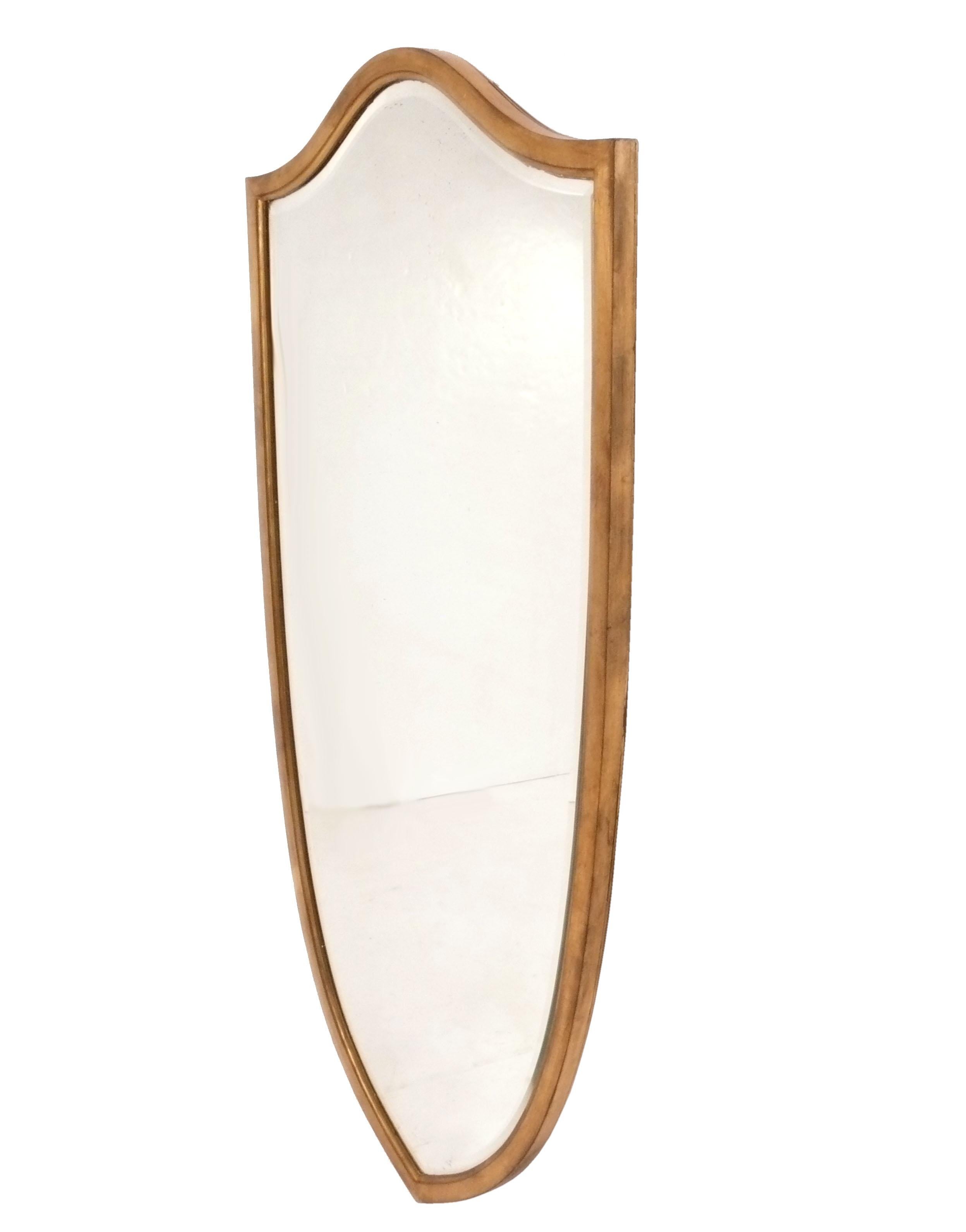 Large Gilt Shield Form Beveled Mirror, Italy, circa 1960s. Retains warm patina with some age spotting to mirror. 