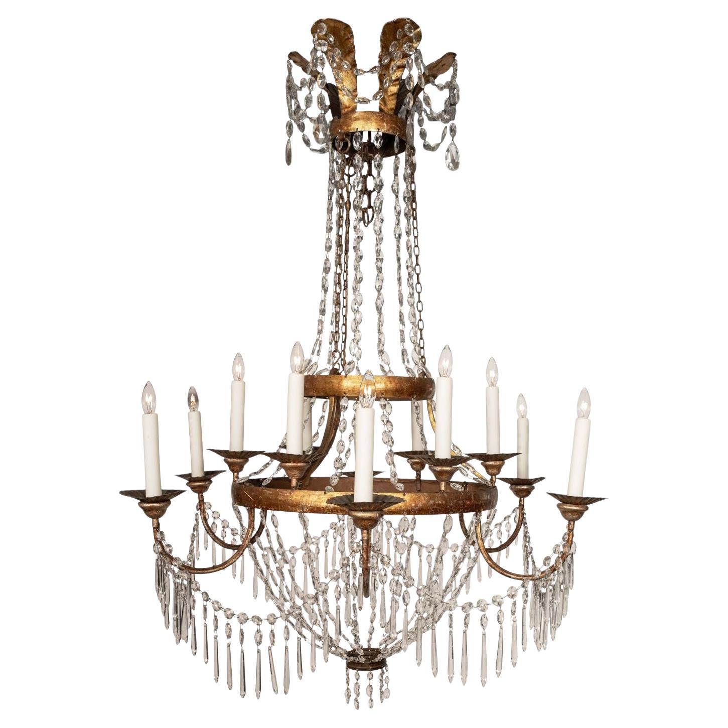 Grande lampadario d'epoca Impero in tole dorate e cristallo