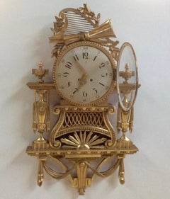 Große Wanduhr aus vergoldetem Holz von Gustav Becker