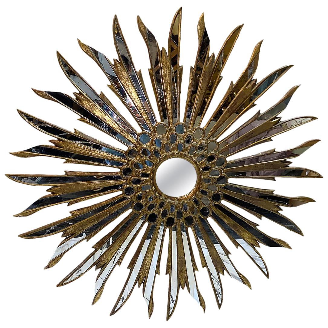 Grand miroir Sunburst en bois doré