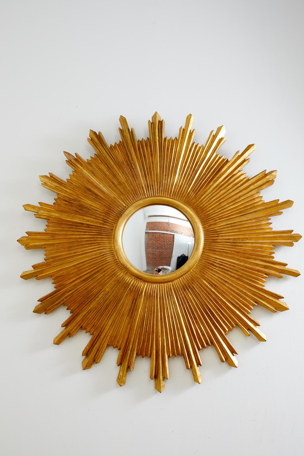 Hand-Crafted Large Giltwood Carved Convex Sunburst Mirror For Sale