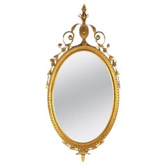 Large Giltwood Oval Wall Mirror with Floral, Foliate & Scroll Elements 20thC
