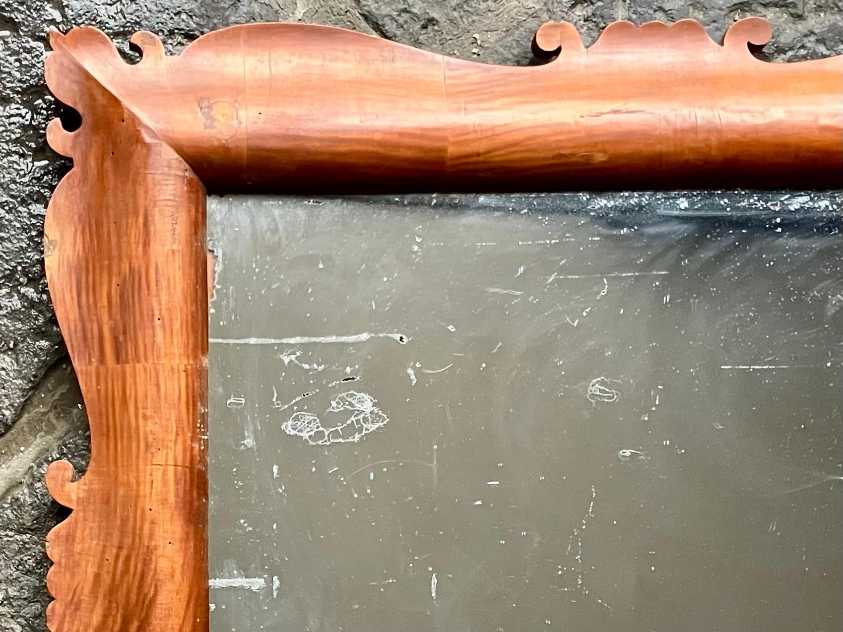 Large Gio Ponti Style Mirror. Neo-Baroque style with scrolling and curved natural wood veneer frame in original vintage condition with antique mercury mirror plate. Italy, circa 1940's 

Dimensions: 36