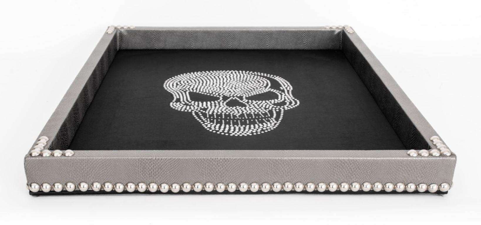 Large glam rock skull tray, with a studded skull on a faux silk background, surrounded by a faux snakeskin studded ledge, and ultrasuede bottom. 

Dimensions: 2.5