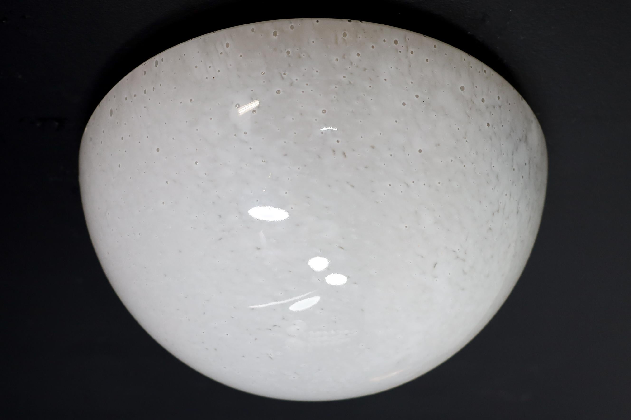 Large Glashütte Limburg Frosted glass ceiling lights or sconces, Germany 1970s

A set of excellent large domed-shaped ceiling lights or sconces by the esteemed Glashütte Limburg factory in Germany circa 1970. It is composed of a domed shape