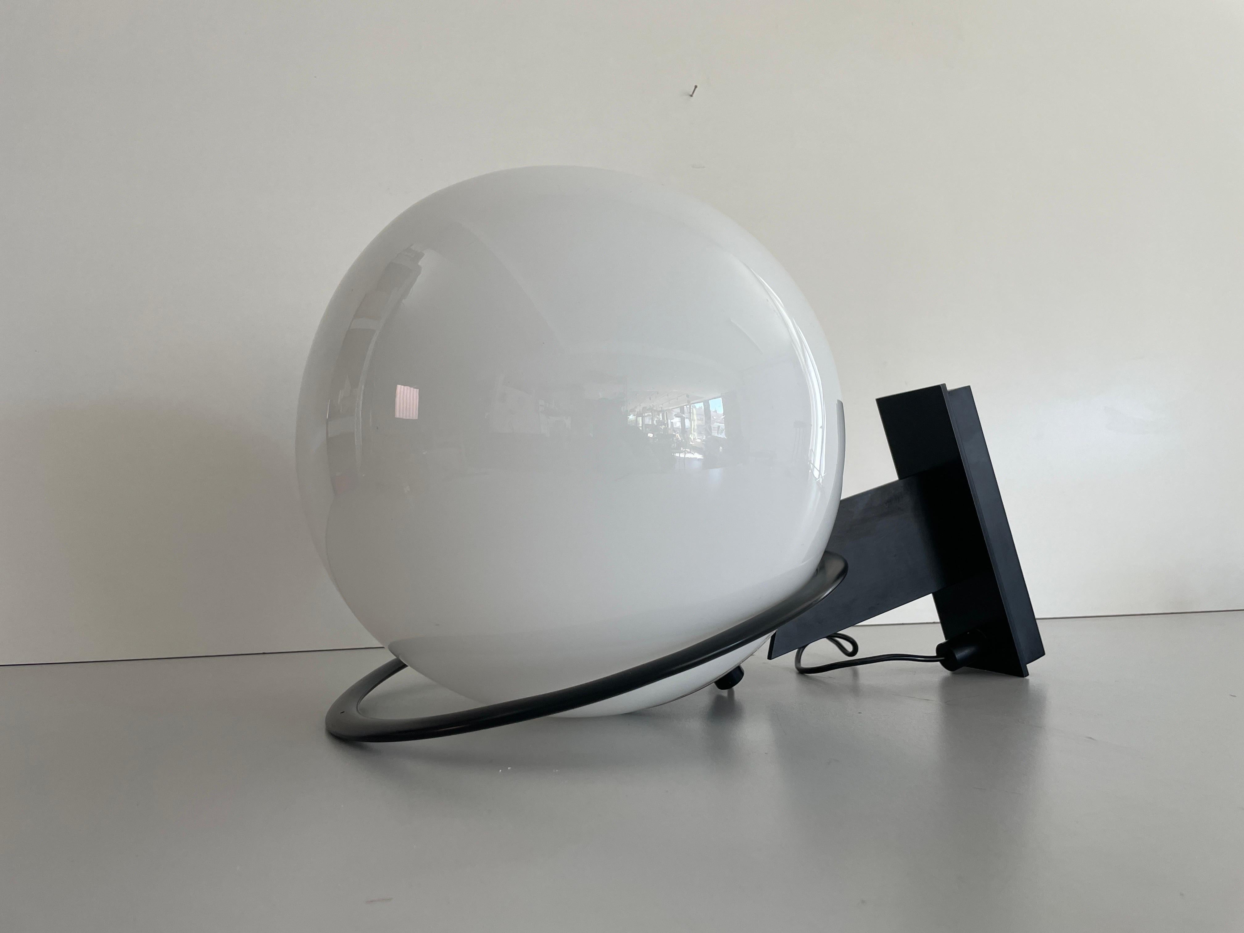 Large Glass Ball Wall Lamp by Candle, 1960s, Italy

Minimalist and rare design. 

Lampshade is in good condition and very clean. 
This lamp works with E27 light bulbs. 
Max 100W Wired and suitable to use with 220V and 110V for all countries. 
Wear