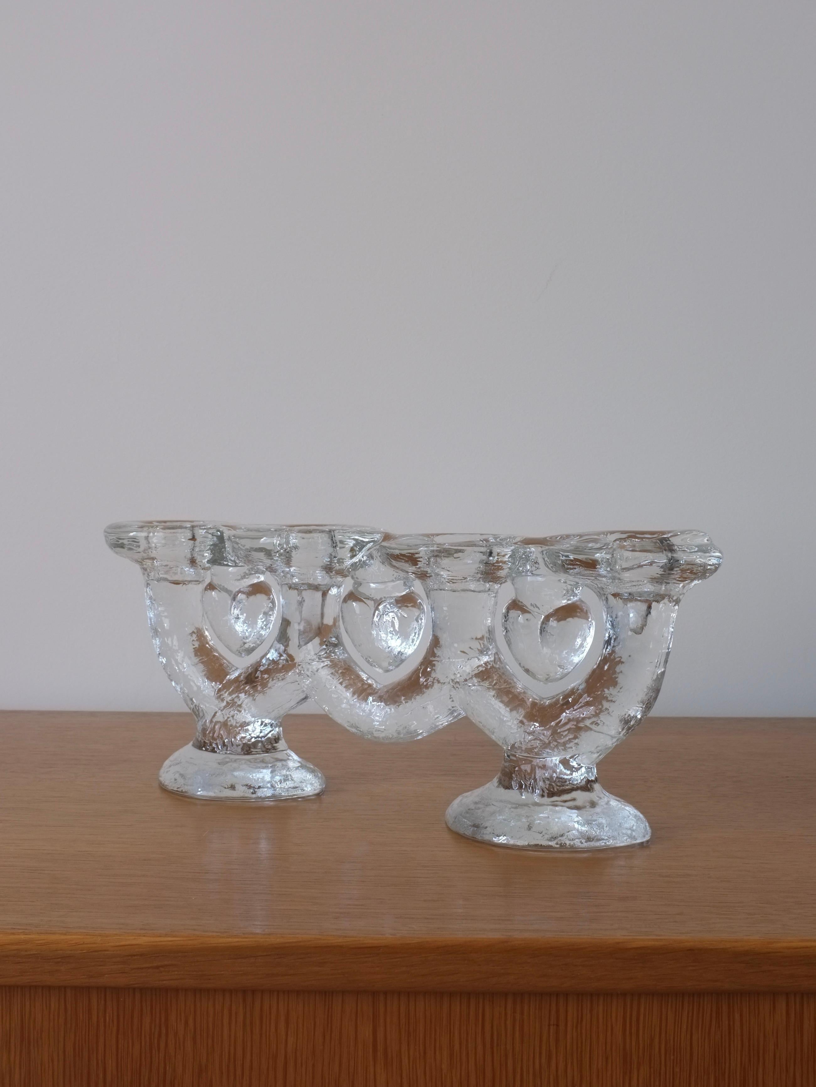 Vintage art glass four candle sticks holder from Pukeberg Glasbruk. The design is by Staffan Gellerstedt. 2 items are available.

Additional information:
Country of manufacture: Sweden
Design/Manufacture period: 1970s
Dimensions: 31 W x 6.5 D x 12 H