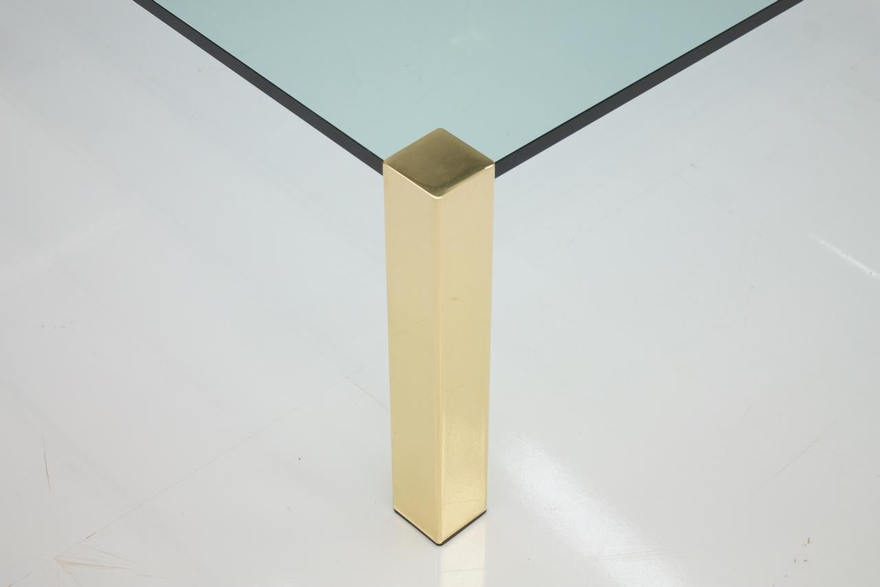 Large glass coffee table Sokrates with gold polished legs by Peter Draenert, Germany, 1970s

Good condition.