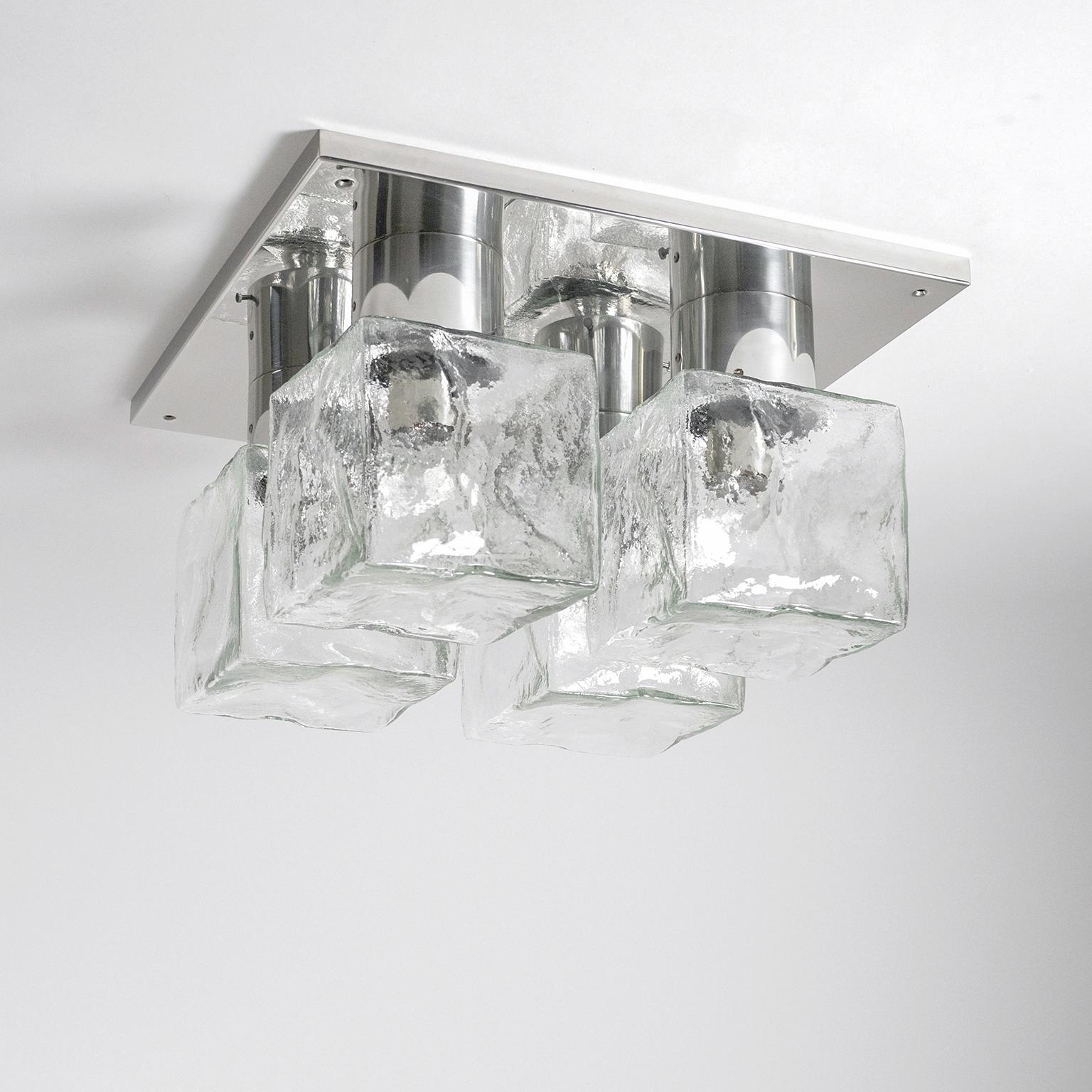 Glamorous glass ice cube flush mount by Kalmar from the 1970s. This is one of the very rare versions with large glass ice cubes (6.5 x 6.5 inches) as opposed to the more common type with small glass cubes. The hardware is polished stainless steel