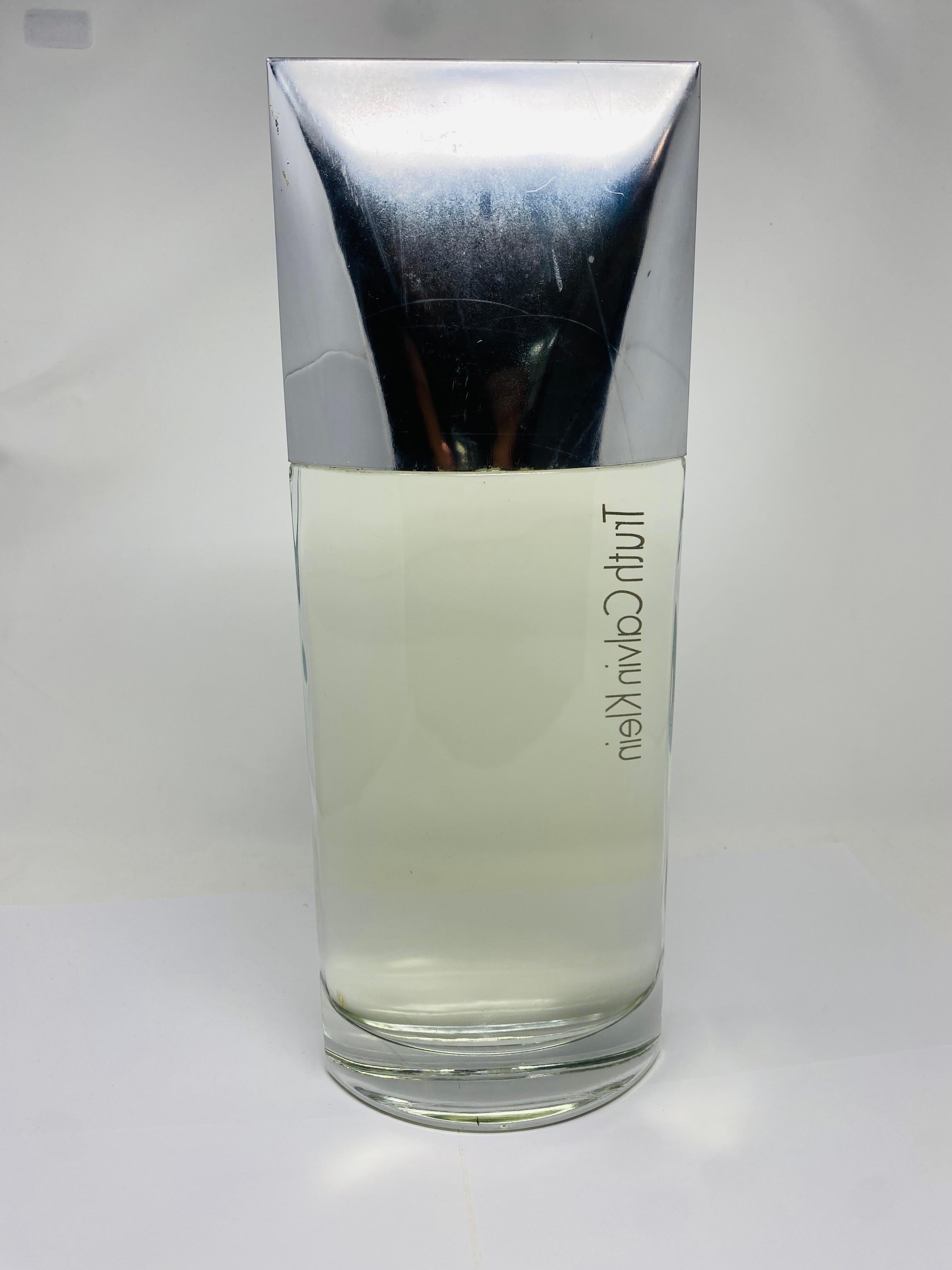Hand-Crafted Large Glass Factice Truth by Calvin Klein For Sale