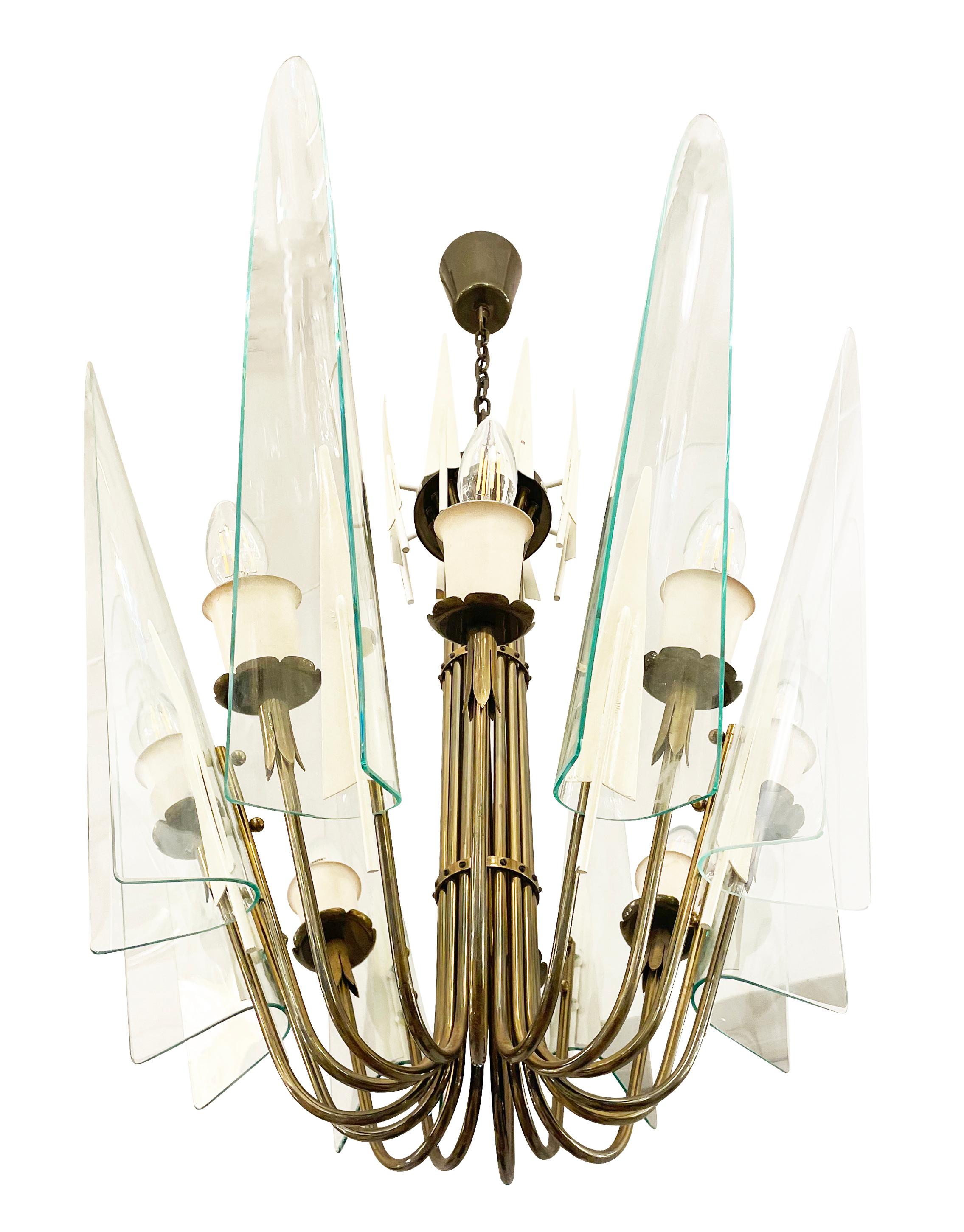 Large Italian mid-century chandelier attributed to Pietro Chiesa for Fontana Arte. The attribution is given based on the many floral inspired details and the clear glass petals which can be seen as precursors to the glass leaves found on Max