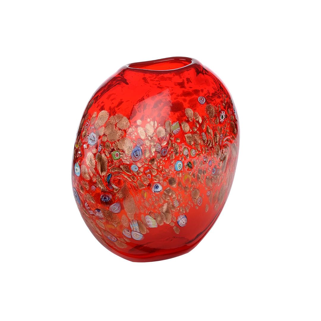 Forma rotonda appiattita con bocca piatta. Murrine multicolori fuse con lamina d'oro frantumata. Base lucida. Dimensioni circa: altezza 30 cm, larghezza 30 cm, profondità 13 cm.