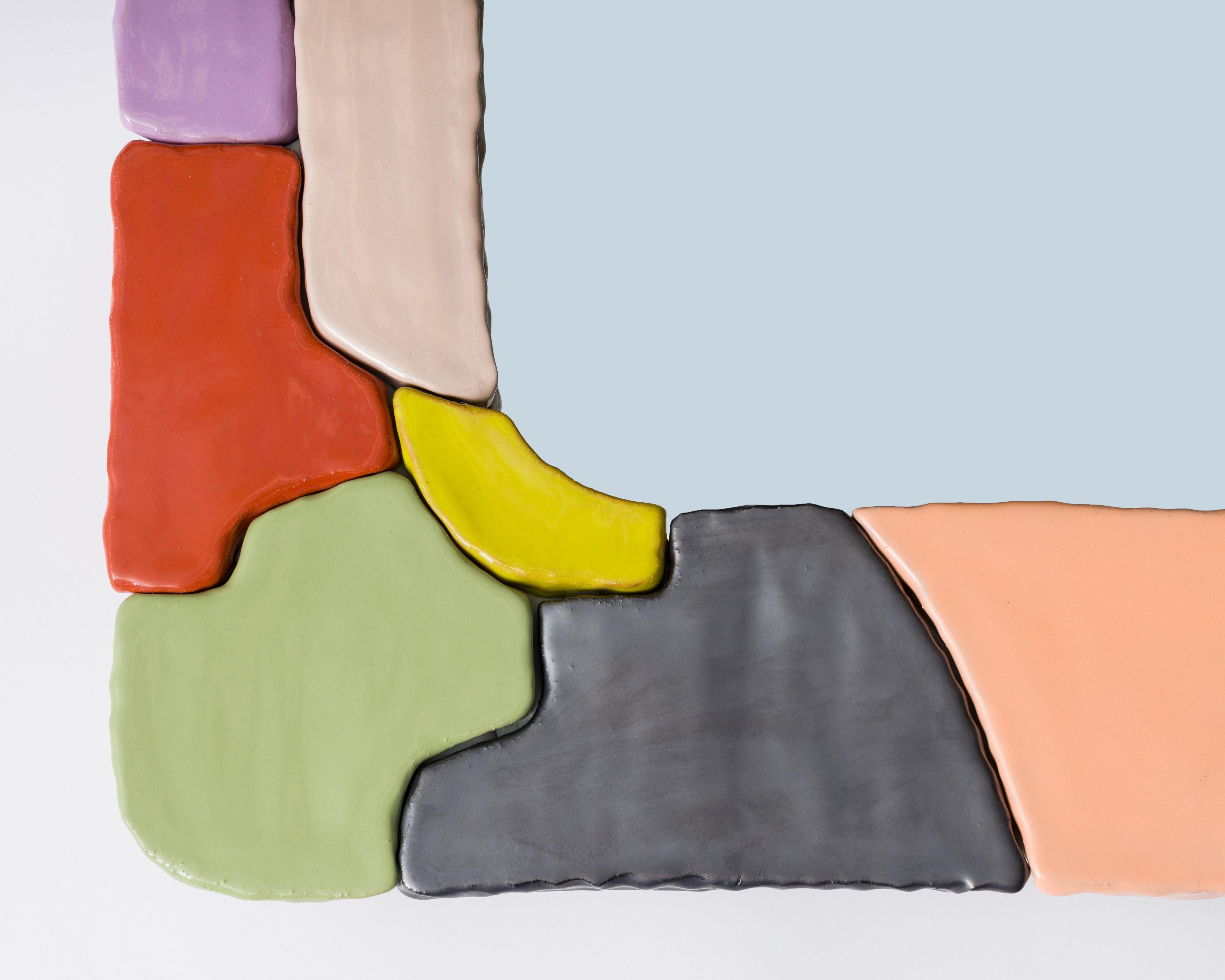 Sean Gerstley's large-scale glazed ceramic wall mirror. Created from what the artist describes as 