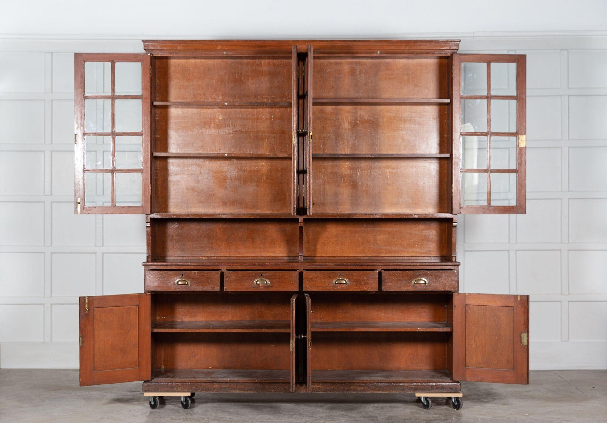 circa 1890
Large Glazed Pine & Oak bookcase / housekeepers cabinet
sku 1295
W206 x D44 x H226 cm
Base W203 x D44 x H84 cm
Top W206 x D37 x H142 cm.