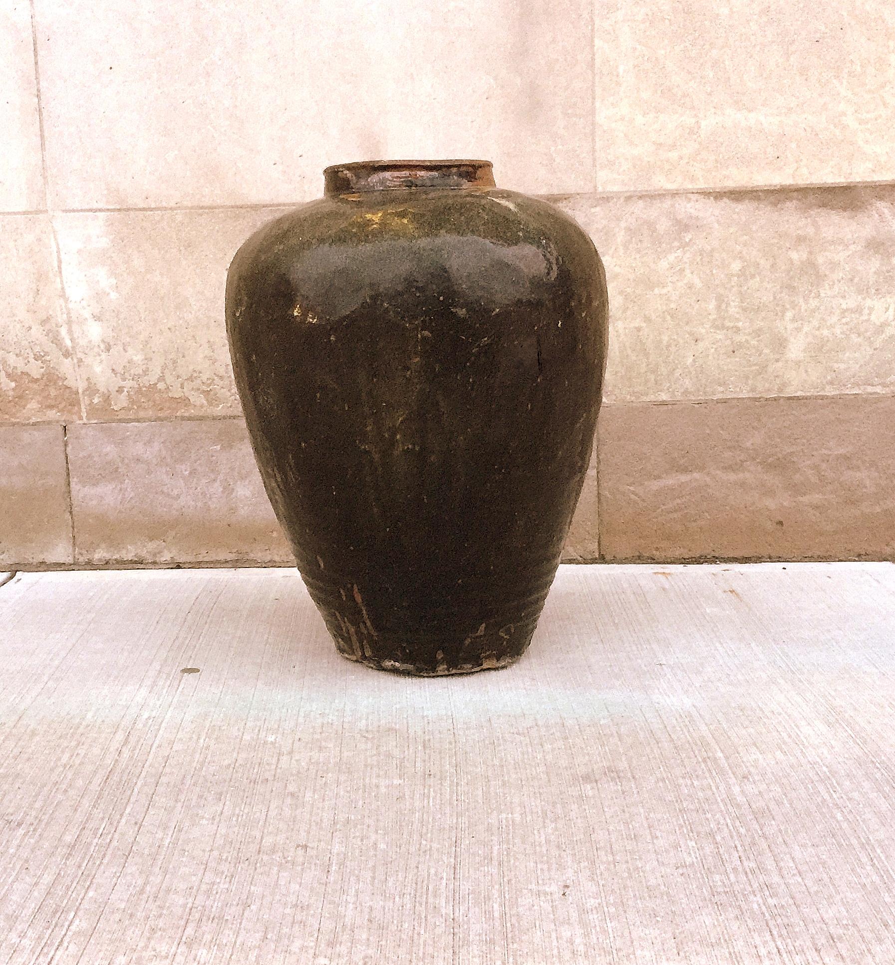 Antiques large glazed pottery Asian wine jar. Widest diameter on the top 19