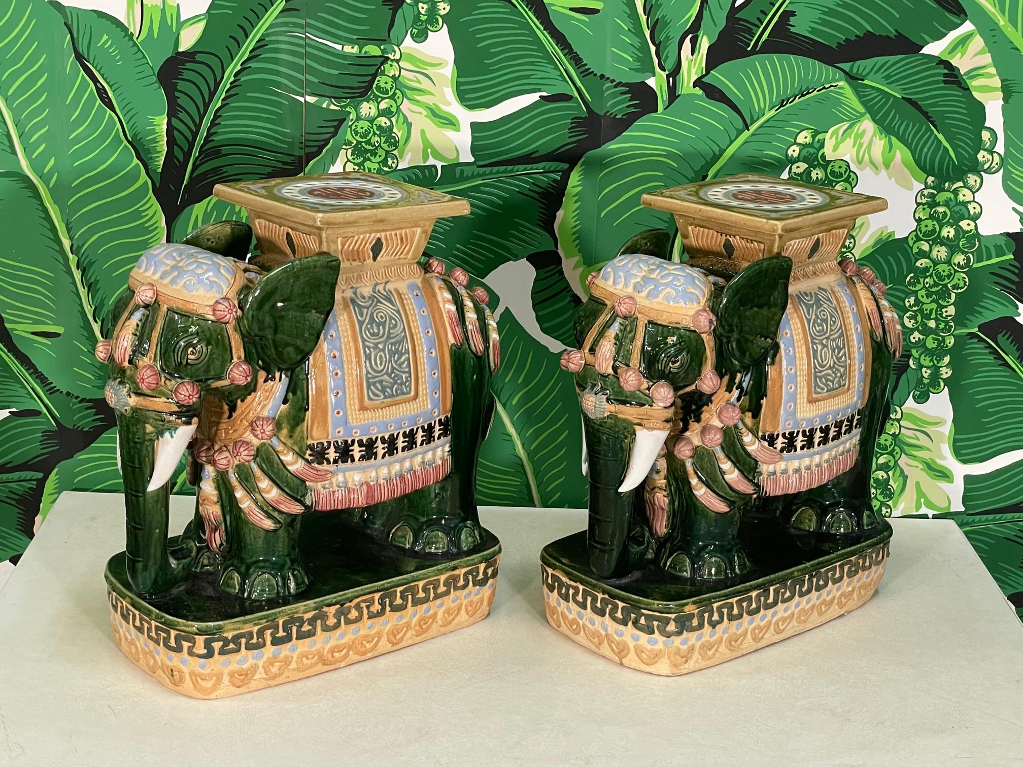 Pair of mid-century glazed terracotta elephant garden stools/seats/stands feature a gorgeous deep green finish with accenting colors. Very good condition. As with all our vintage items, may exhibit scuffs, marks, or wear, see photos for details.

 