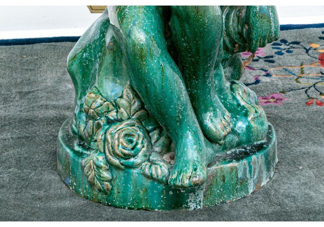 20ième siècle Grande sculpture de jardin Putto en terre cuite émaillée en vente