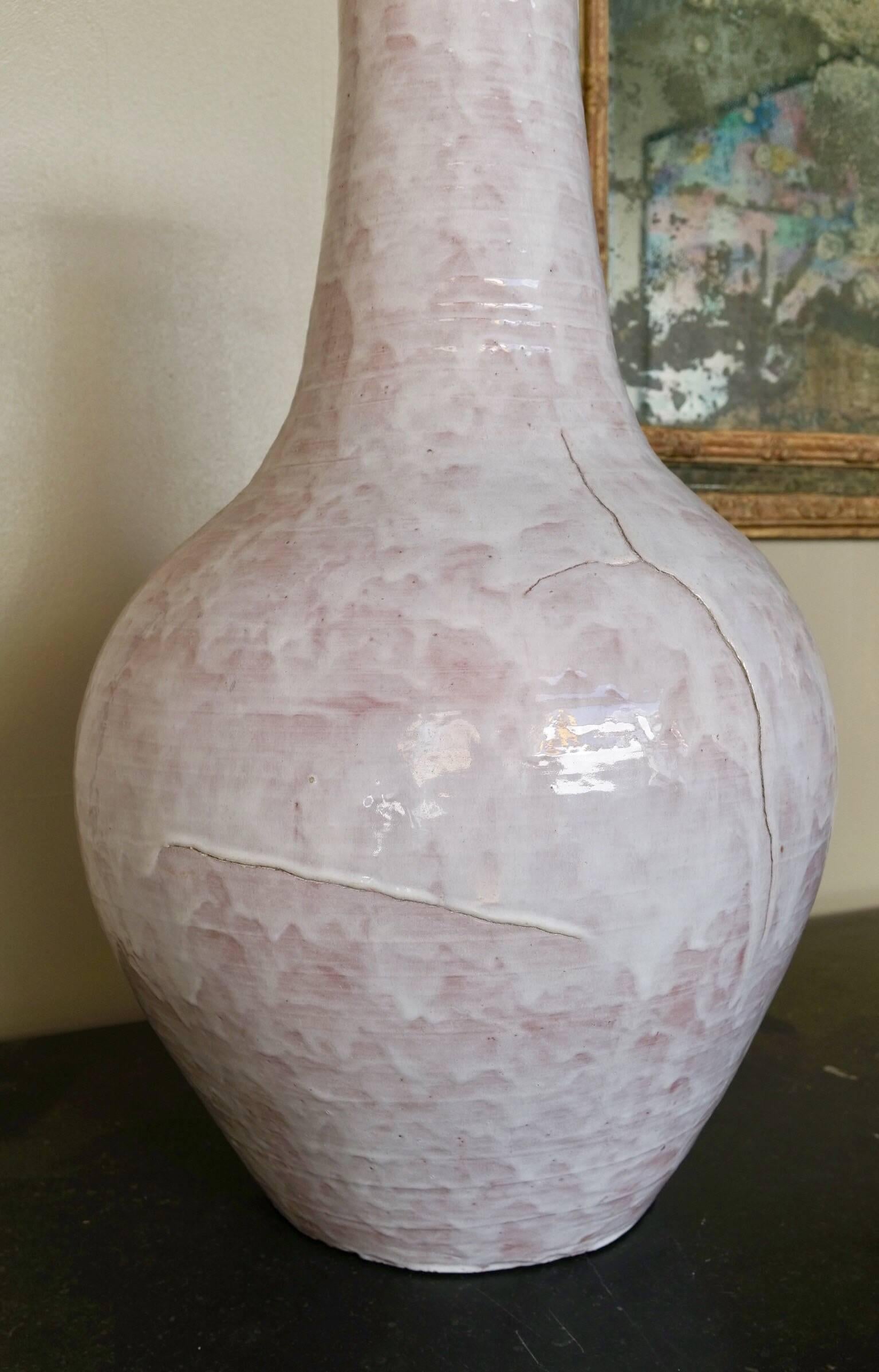 Large glazed white ceramic vase signed by Edouard Cazaux, late 1960.
Signed 