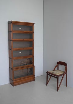 Grandi librerie Globe Wernicke London "a cascata" in mogano, CIRCA 1900