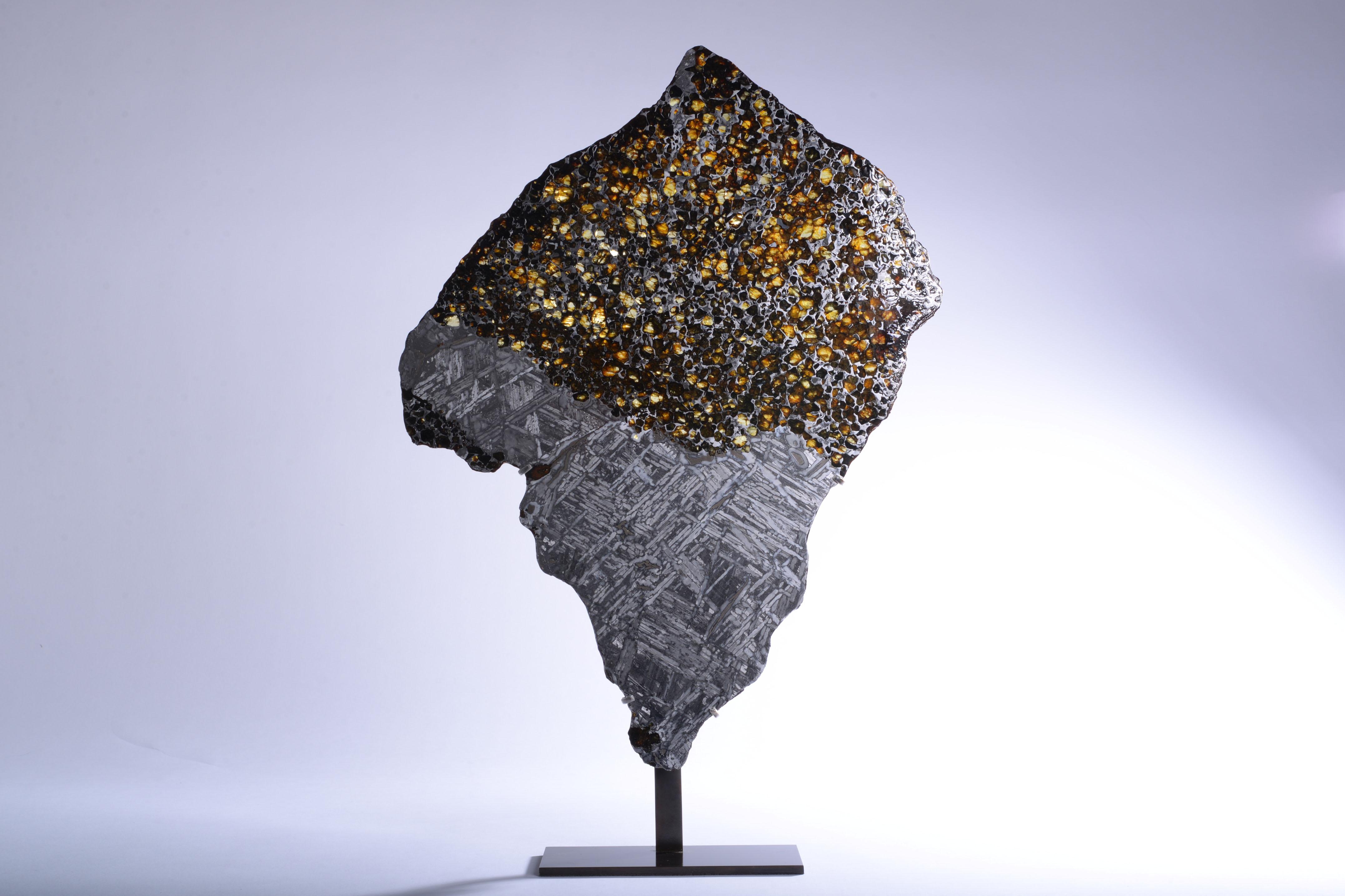 Seymchan meteorite cross-section
circa 4.5 billion y/o
1.4 kg

“This interior section of the Seymchan pallasite displays its two primary constituents – olivine that crystallized in the lower mantle of a differentiated asteroid and metallic