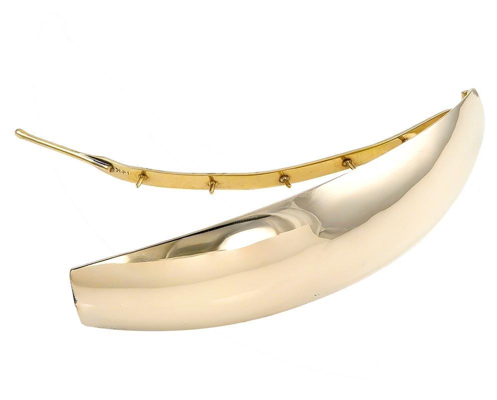 Sleek large barrette.  14K yellow gold.  Has little 