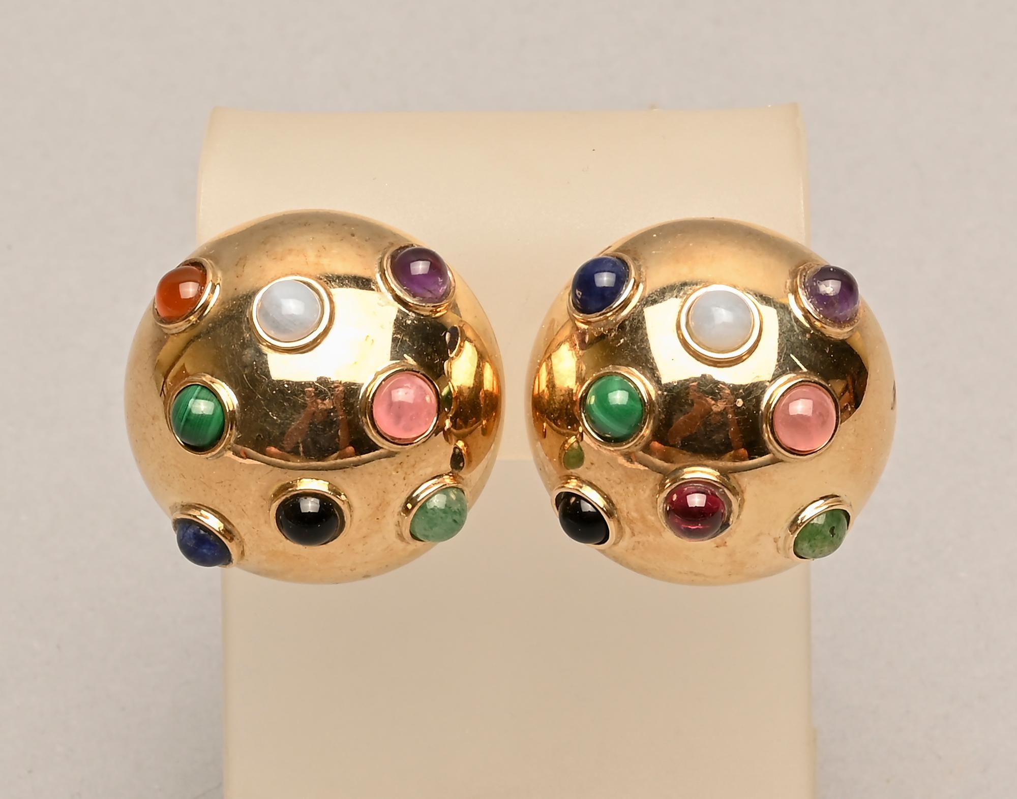 Bold and colorful dome earrings with eight cabochon stones in each that include: amethyst; lapis lazuli; chalcedony; citrine; rose quartz and malachite. The variety of colors makes them easy to wear with virtually anything. The stones are set in