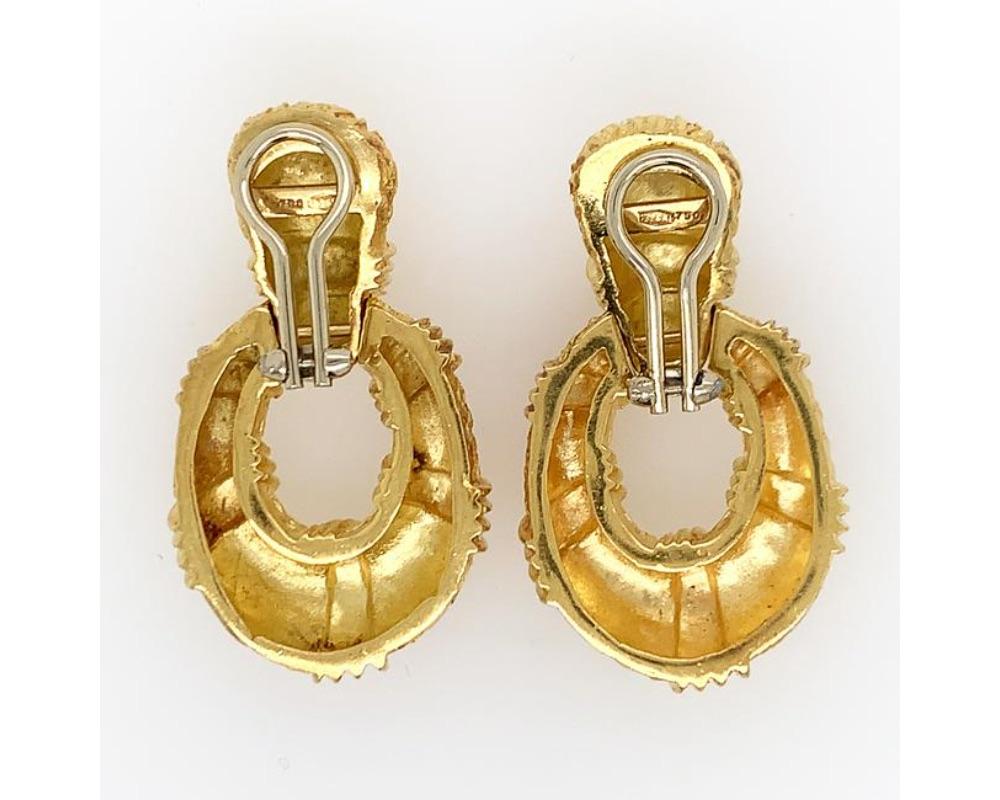 18K Y/gold textured surface earclips, stamps 750, measures 1 3/4 x 1 inch, weight 24.1 dwt