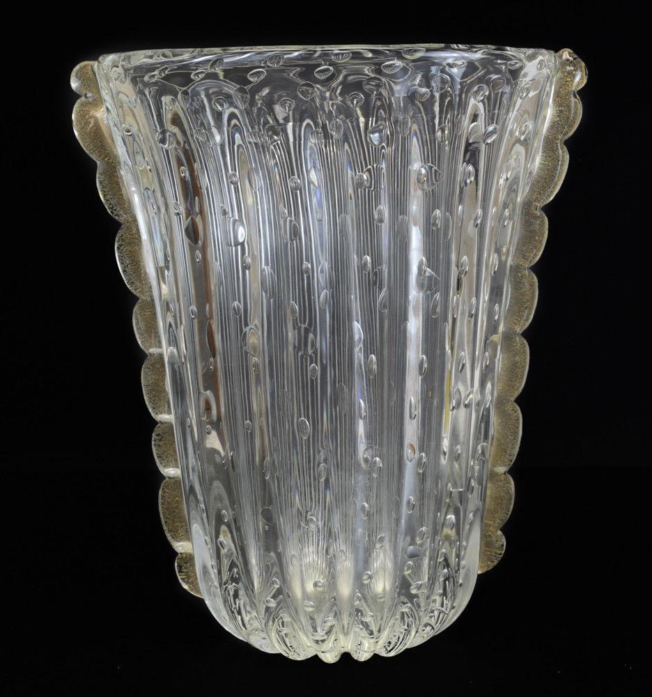 Large gold fleck and controlled bubble art glass vase by Ercole Barovier, circa 1960. Controlled bubbles with a scallop lobed body. Beautiful scallop rimmed edges to the sides with gold flecks. Weight Approx., 6 lbs 

Measures approximate., 12.5”