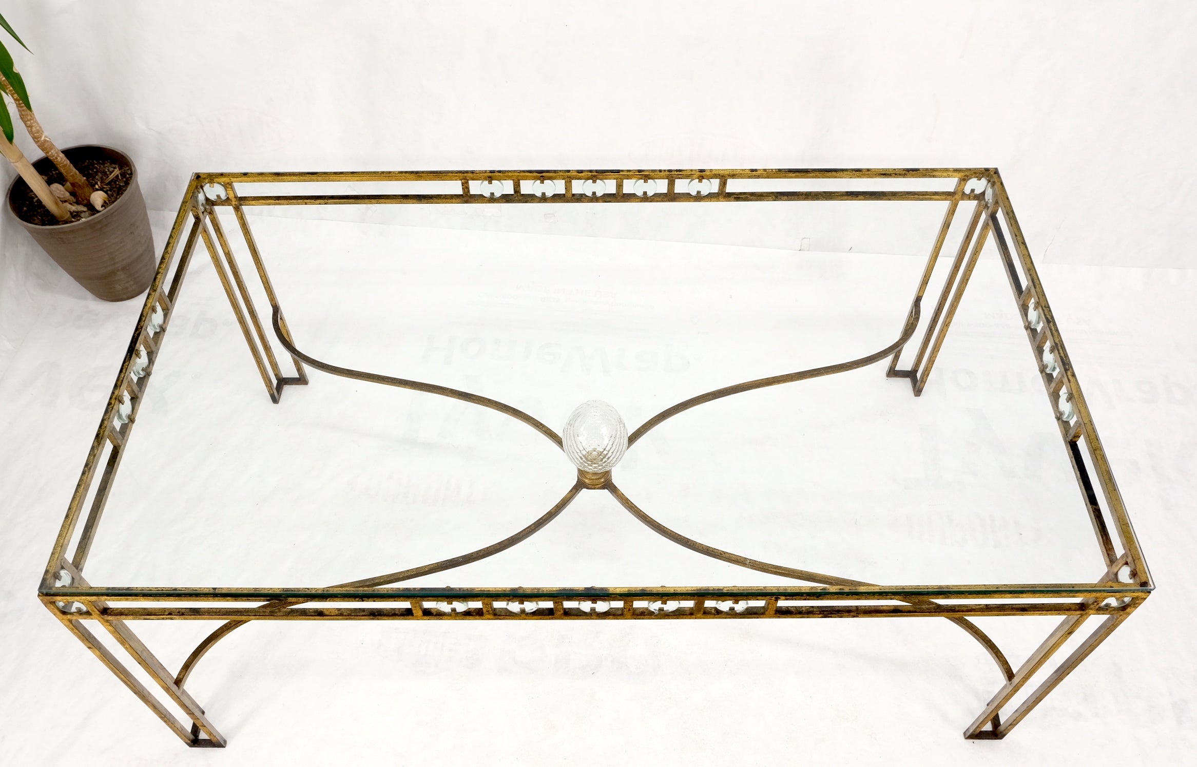 Large gold gilt iron base glass top cut glass inserts finial dining conference table. Hollywood Regency decor match.