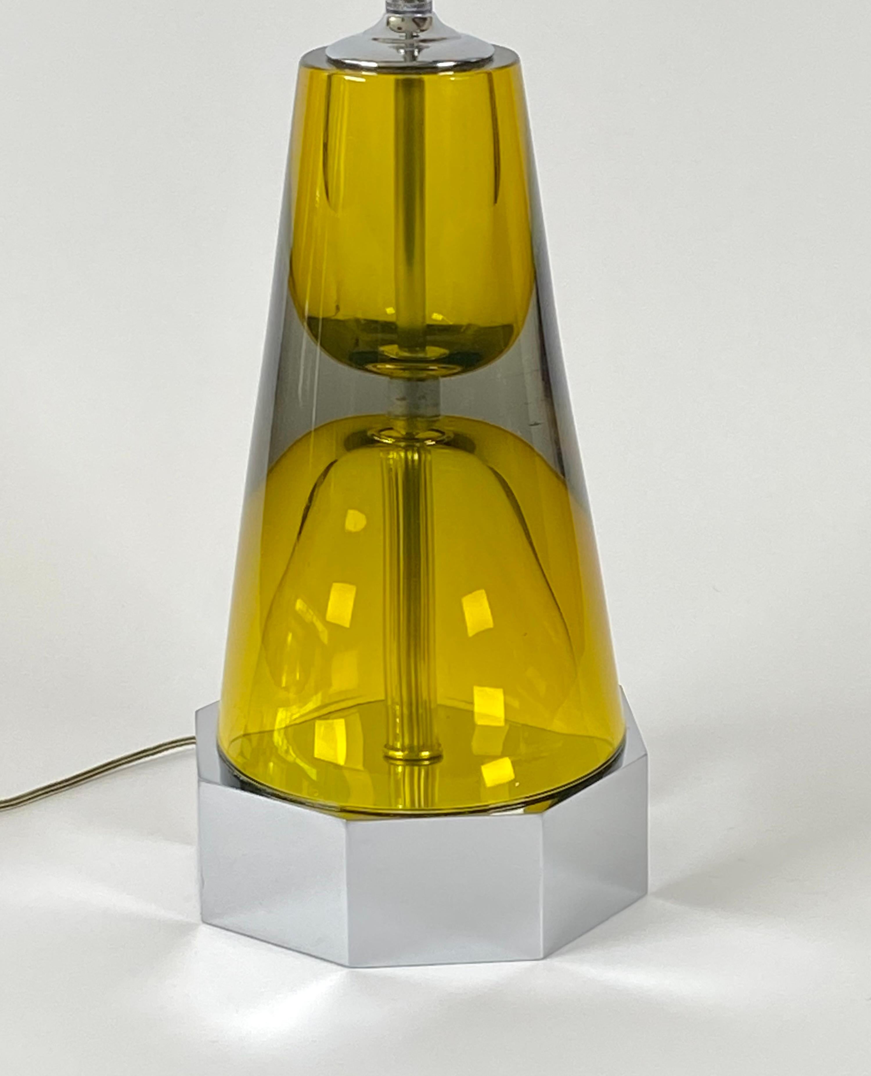 Large scale Murano Sommerso glass table lamp with all original chromed hardware, thick amber green colored glass body resting on a chromed octagonal base, with two chain pull sockets and a switch on the base. The finial has an additional 2 inch