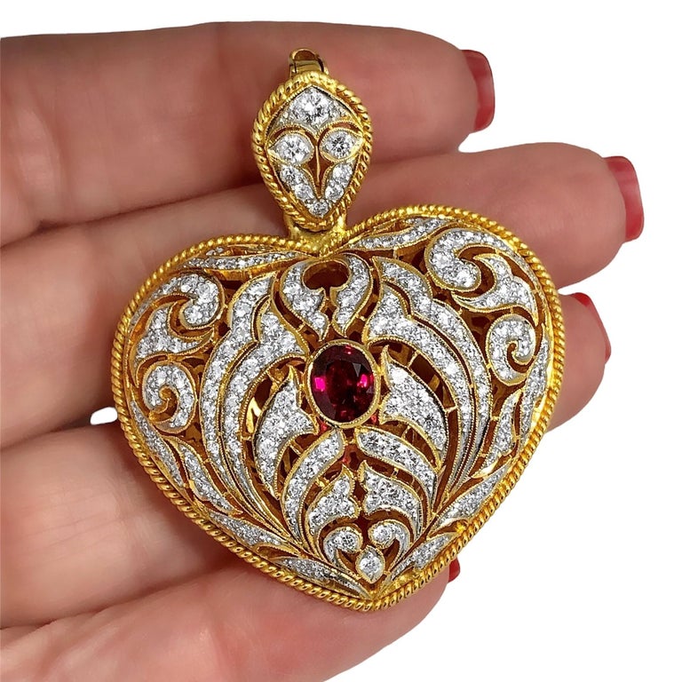 Women's Large Gold Hand Pierced Diamond Encrusted Puffed Heart Pendant with Ruby Center For Sale