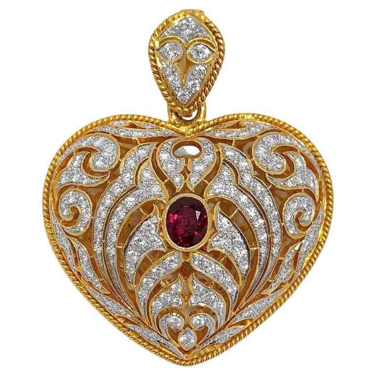 Large Gold Hand Pierced Diamond Encrusted Puffed Heart Pendant with Ruby Center For Sale