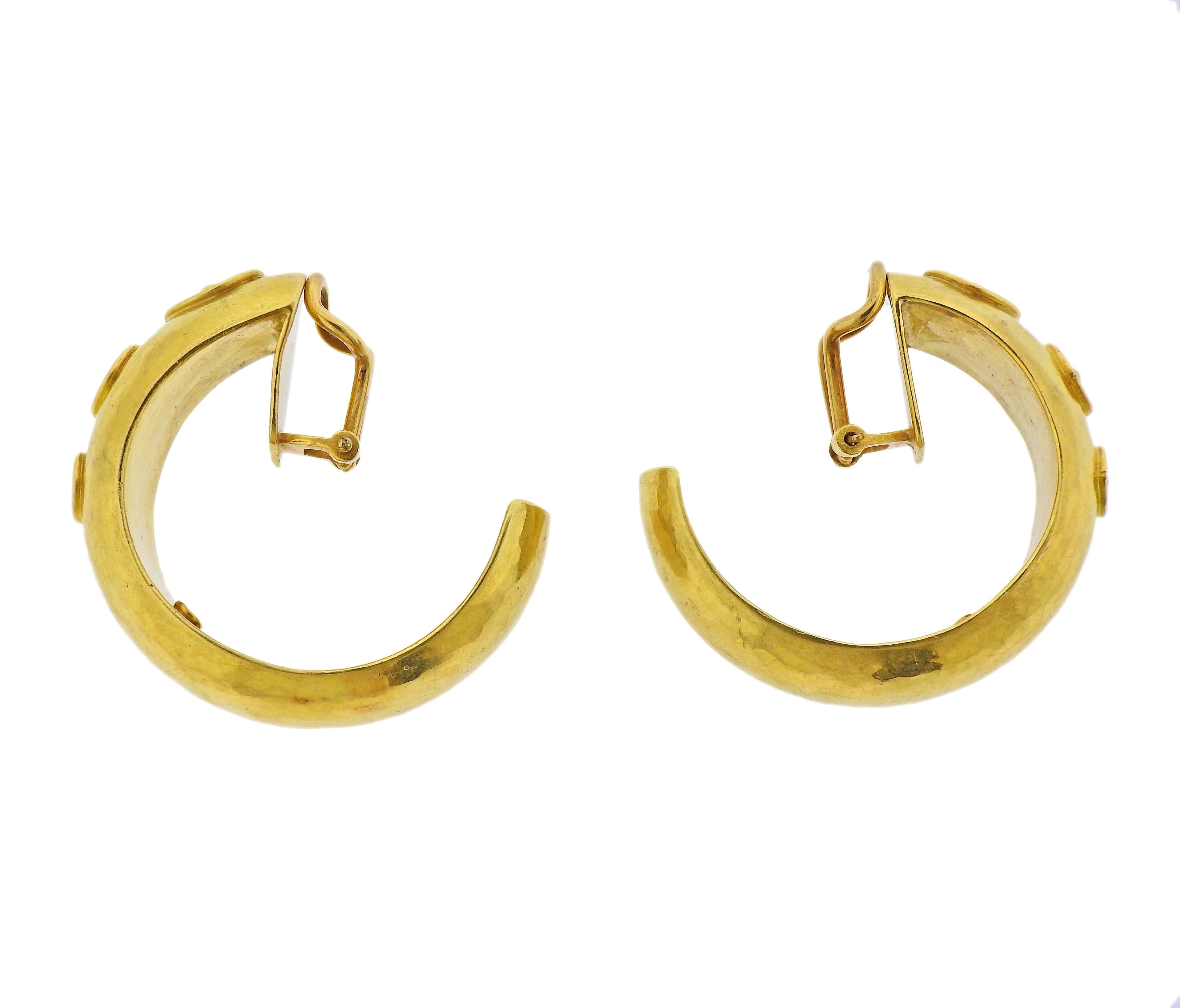 Pair of large 18k yellow gold hoop earrings. Earrings are 36mm in diameter x 15mm wide. Marked: 750. Weight - 25.9 grams. 