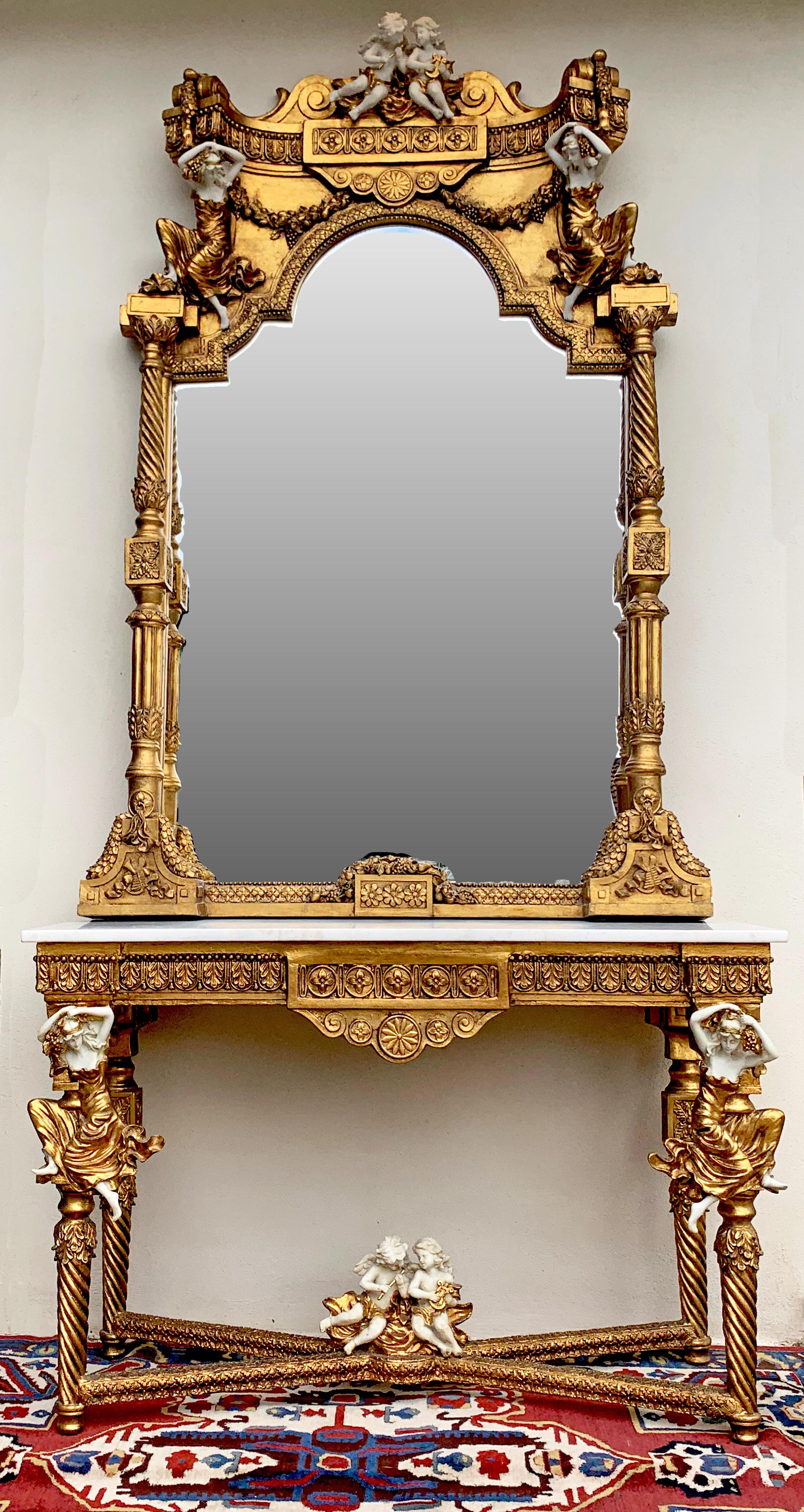 Beautiful and ornate solid wood mirror with cast stone angels and figures on both mirror and matching console table.
Console table top is a white marble (slight scratches).
Very elegant and luxuriously worked piece, made in Europe. (probably