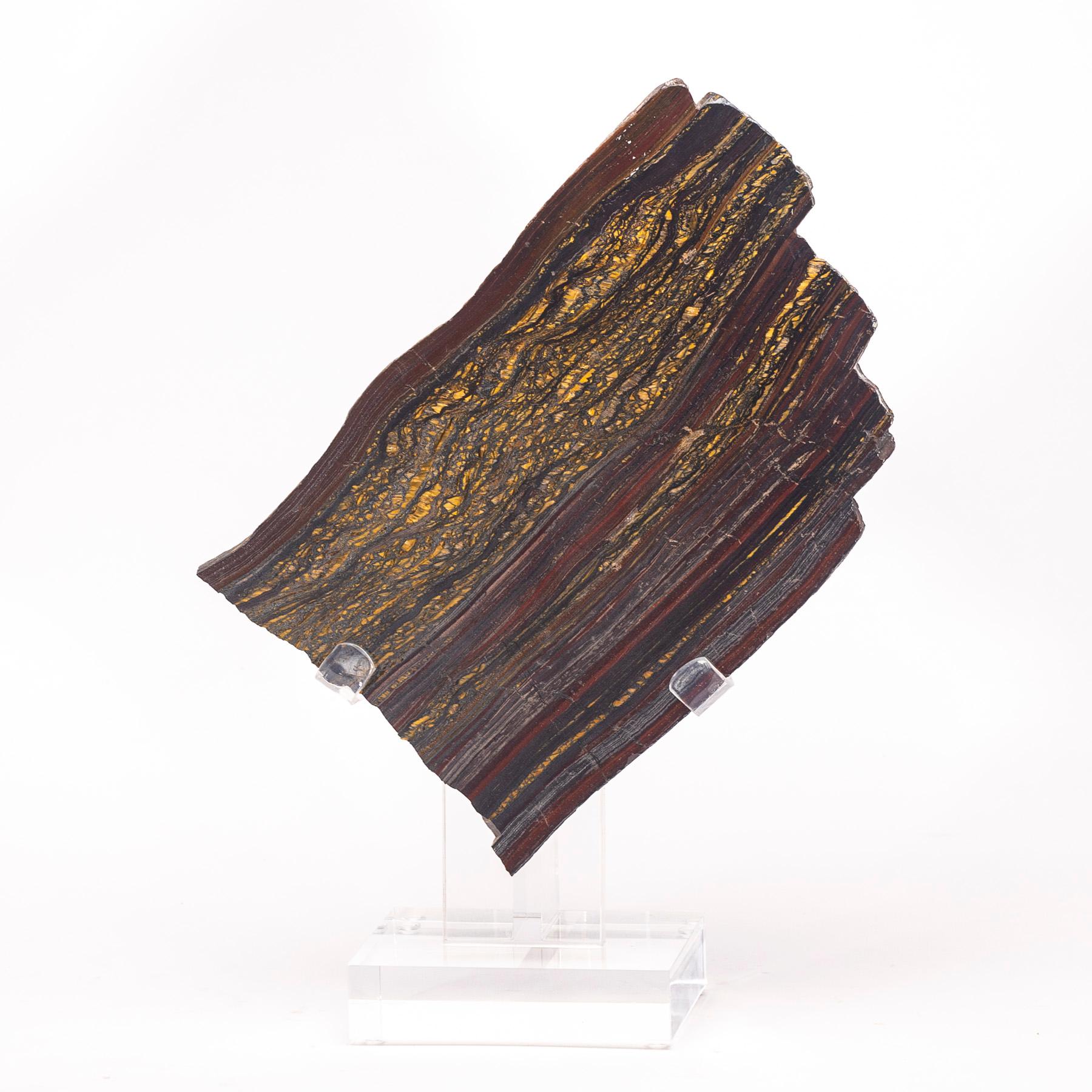 Wunderschöne gebänderte Tiger-Eisen-Platte aus Südafrika

Es ist eine Kombination aus Gold-Tigerauge, Hämatit und rotem Jaspis. Sein Name bezieht sich auf die Zusammensetzung des Steins: Tigerauge und Hämatit, ein eisenhaltiger Stein.
 