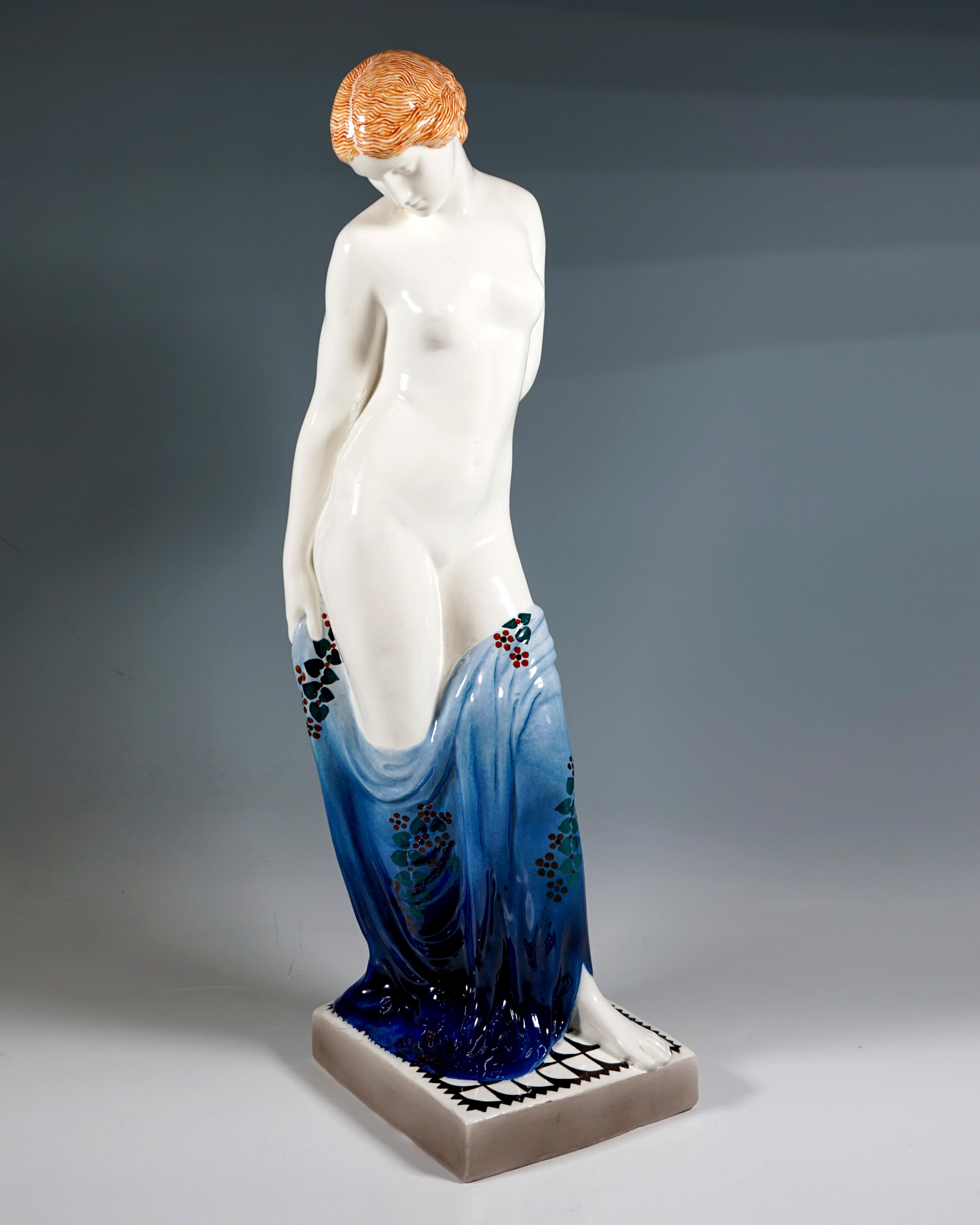 Very large and rare Goldscheider Vienna ceramic figurine:
Art Déco execution of an Art Nouveau design around 1909: young woman as the personification of beauty, with hair tied at the nape of the neck, head tilted to the side and looking down,