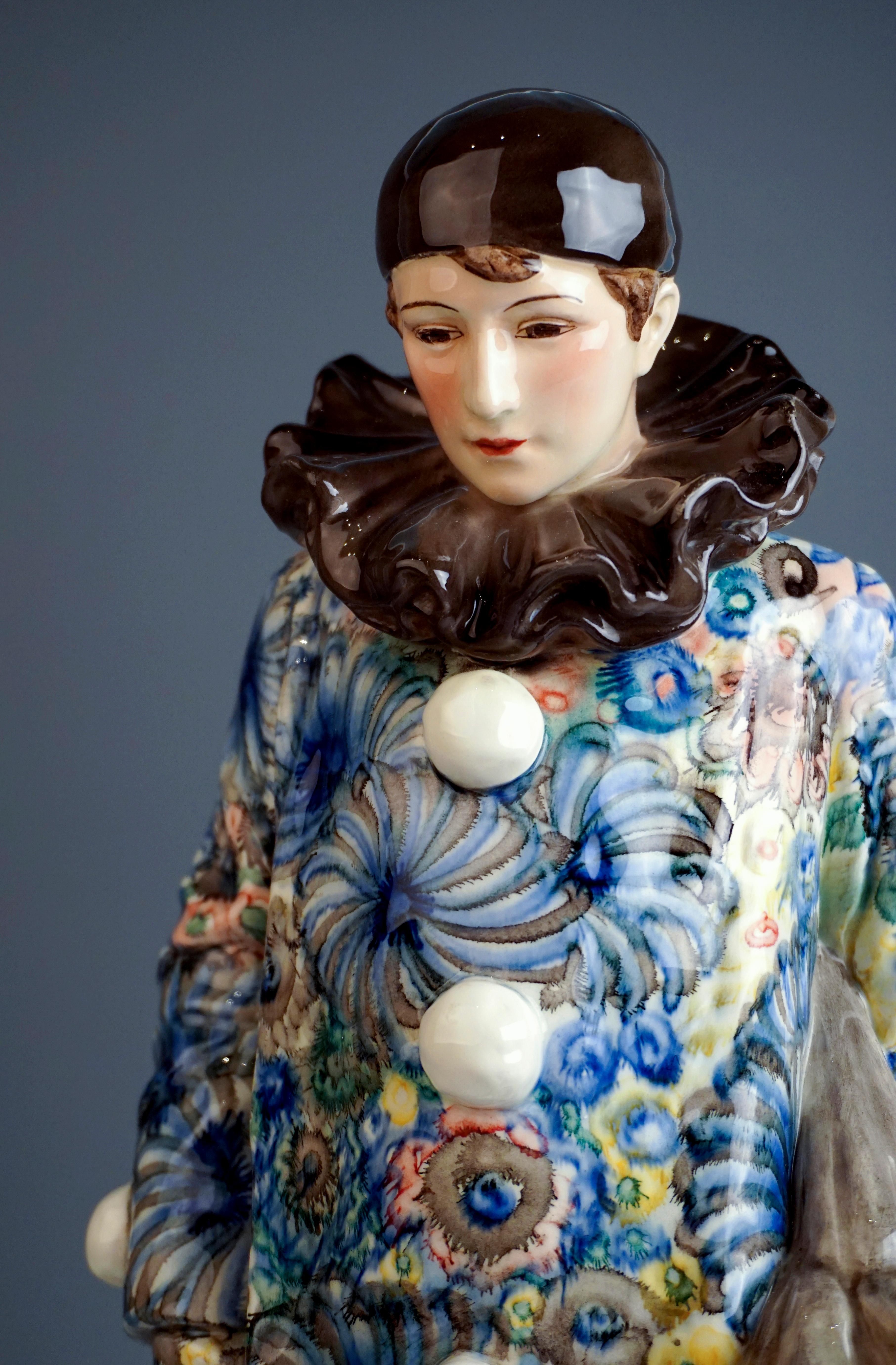 Harlequin With Umbrella And Lantern

Designed by B. Haniroff (XIX - XX) around 1905
for Goldscheider Vienna / Austria
Material: ceramics, painted, glossy finish; metal sheet, electrification
made circa 1925
 
Specifications:
A harlequin lost in