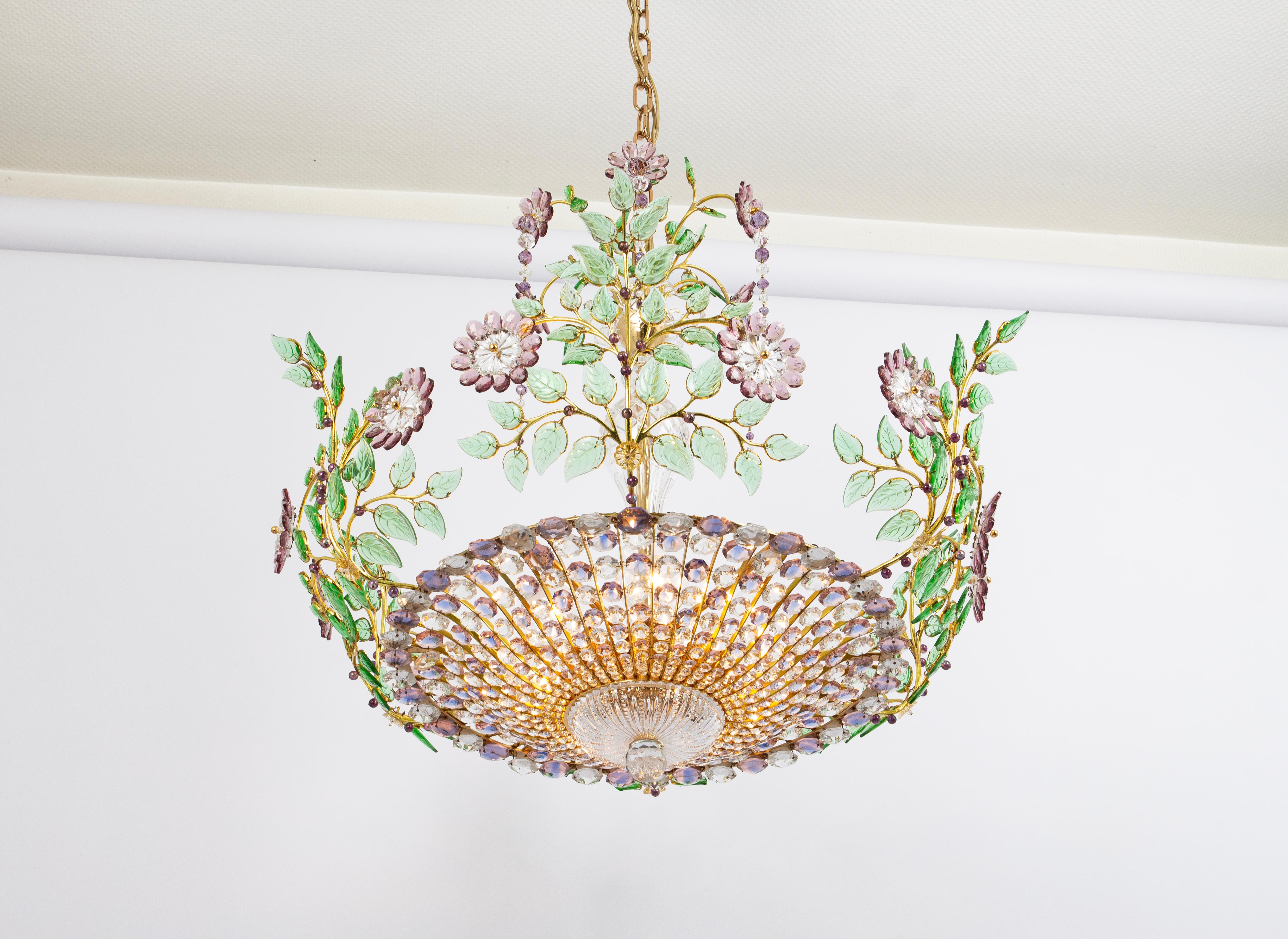 A Gorgeous, high-quality chandelier designed by Palwa, Germany, 1970s.(It is documented in the Palwa sales catalog)
It is made of a gilt brass frame and many crystals. Great scale and exquisite detail.
The Chandelier takes 6 x E27 (standard Bulbs up