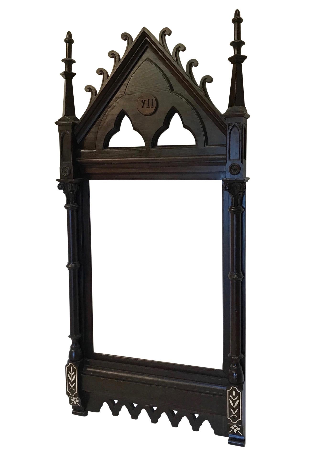 Gothic style mirror or picture frame, black with white accenting. Originally from a California Church framing Stations of the Cross, frames are stained pine, the Roman numerals can be easily removed if desired.
California, circa 1900.
There are 3